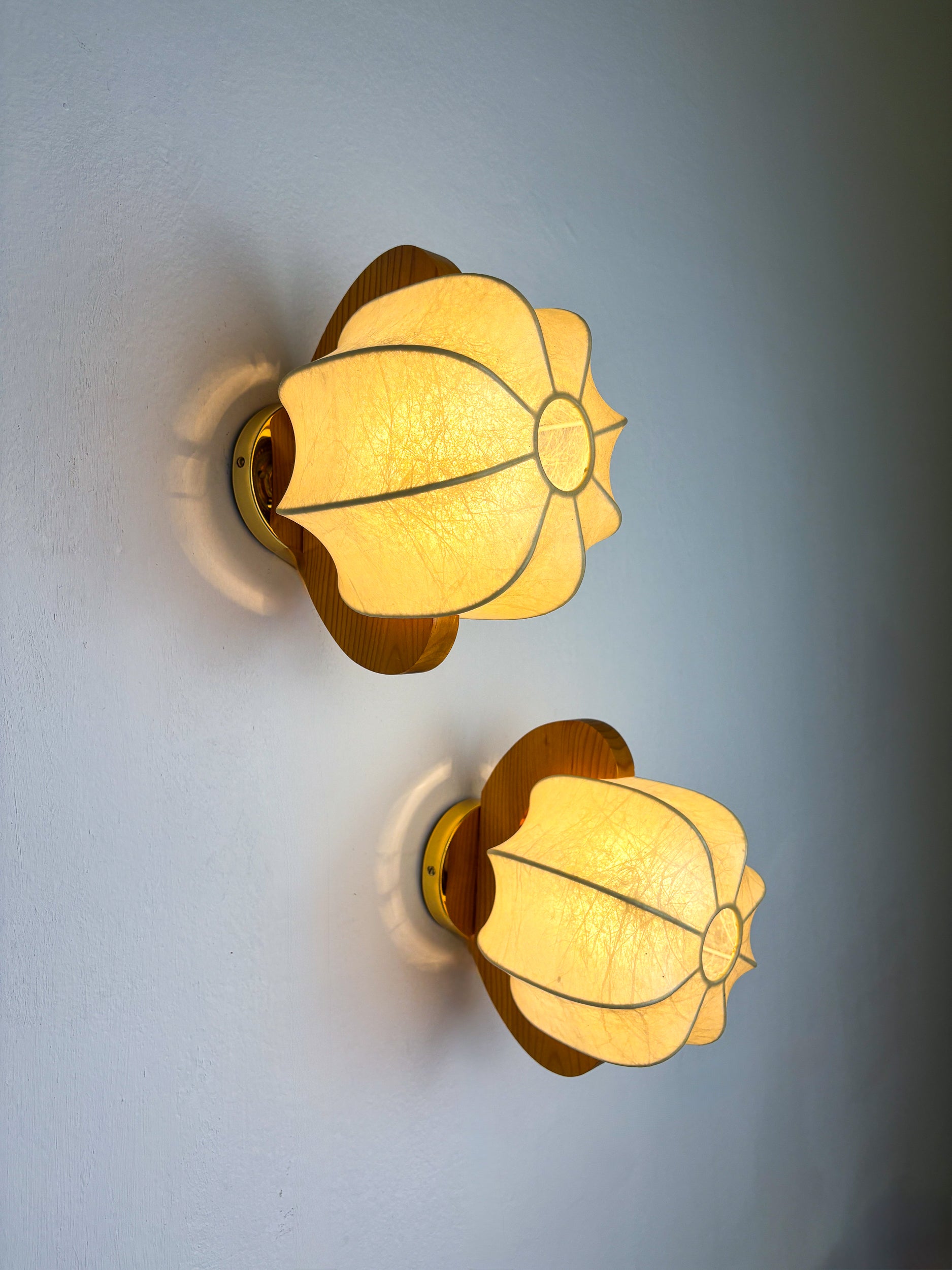 Pair of cocoon sconces with pine, Italy, 1970s