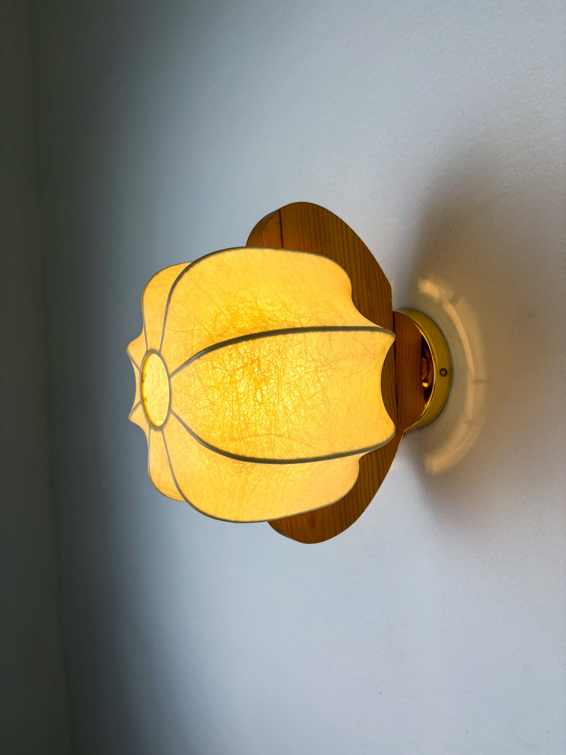 Pair of cocoon sconces with pine, Italy, 1970s
