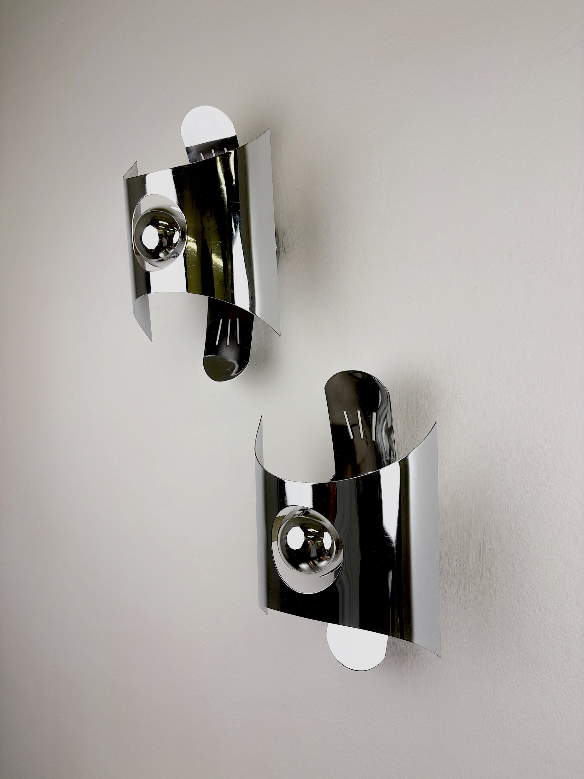 Pair of chromed space age wall lights, Italy, 1970's