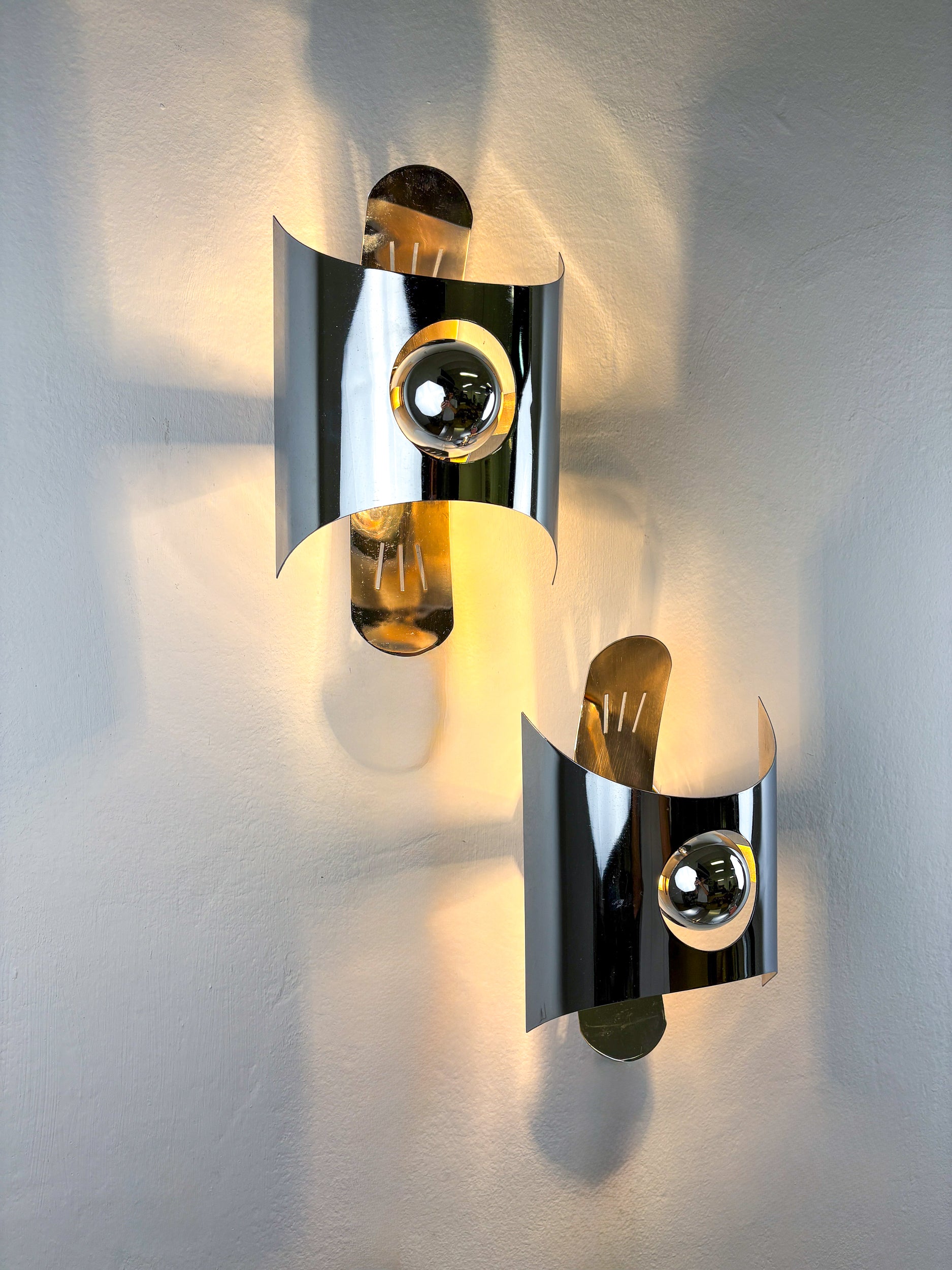 Pair of chromed space age wall lights, Italy, 1970's