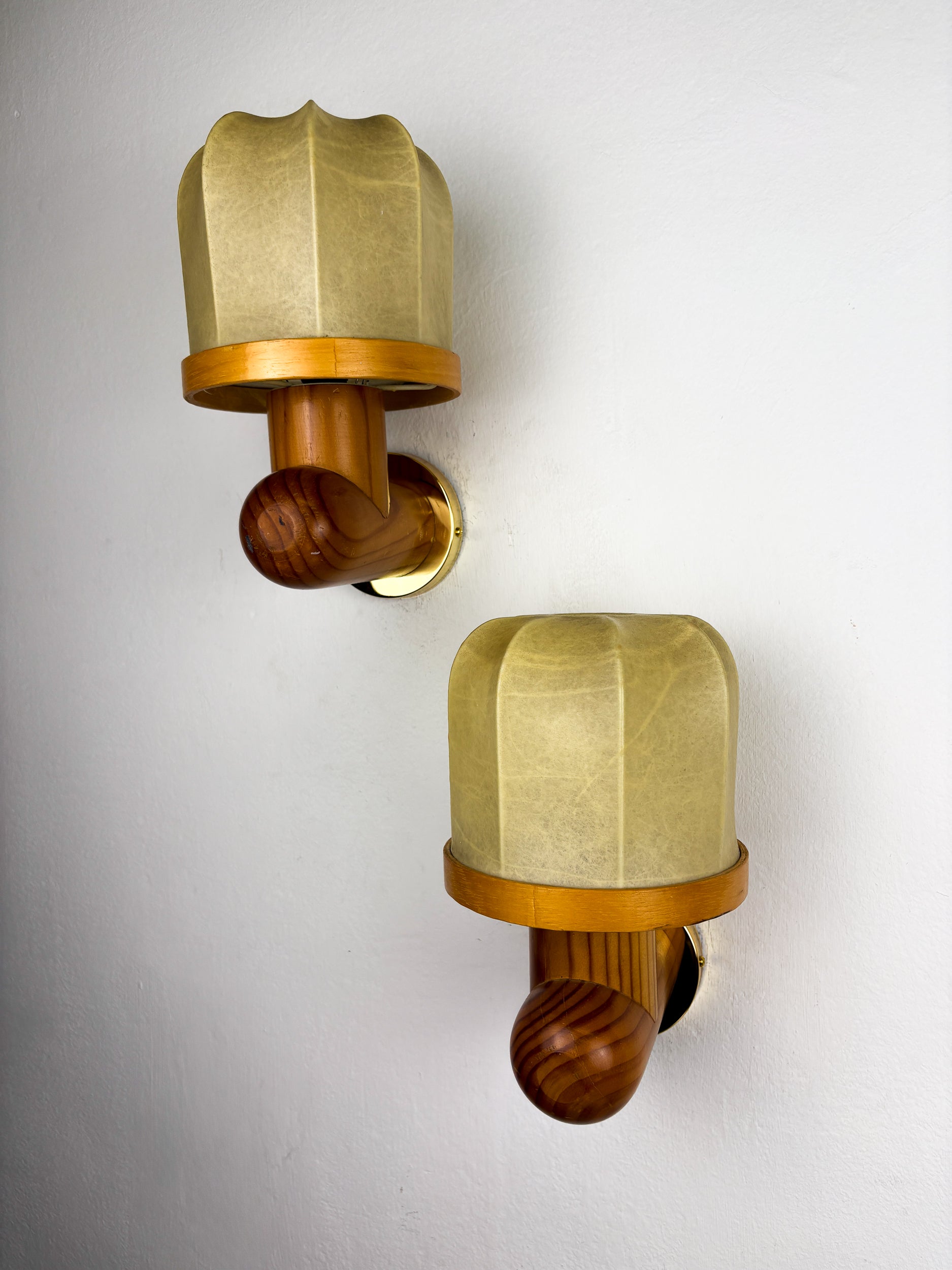 Pair of Italian "Cocoon" wall lights, resin and pine wood, 1970s