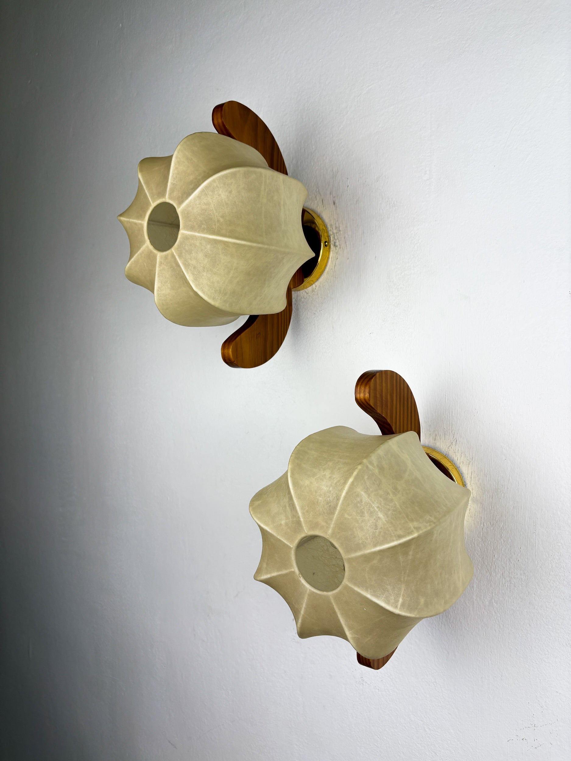 Pair of "Cocoon" wall lights, resin and pine wood, Italy, 1970's