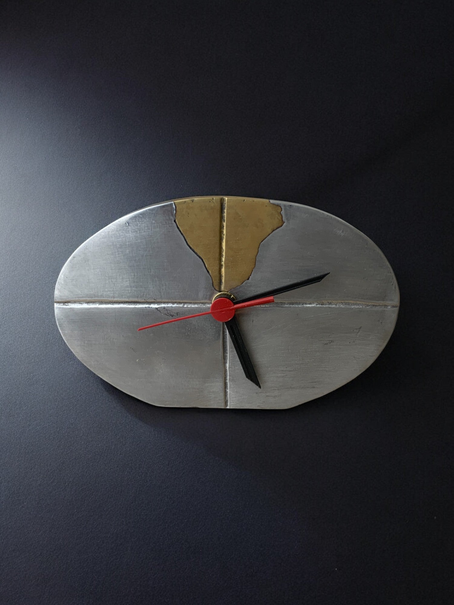 Brutalist clock by Art3, brass and aluminum, Spain, circa 1980