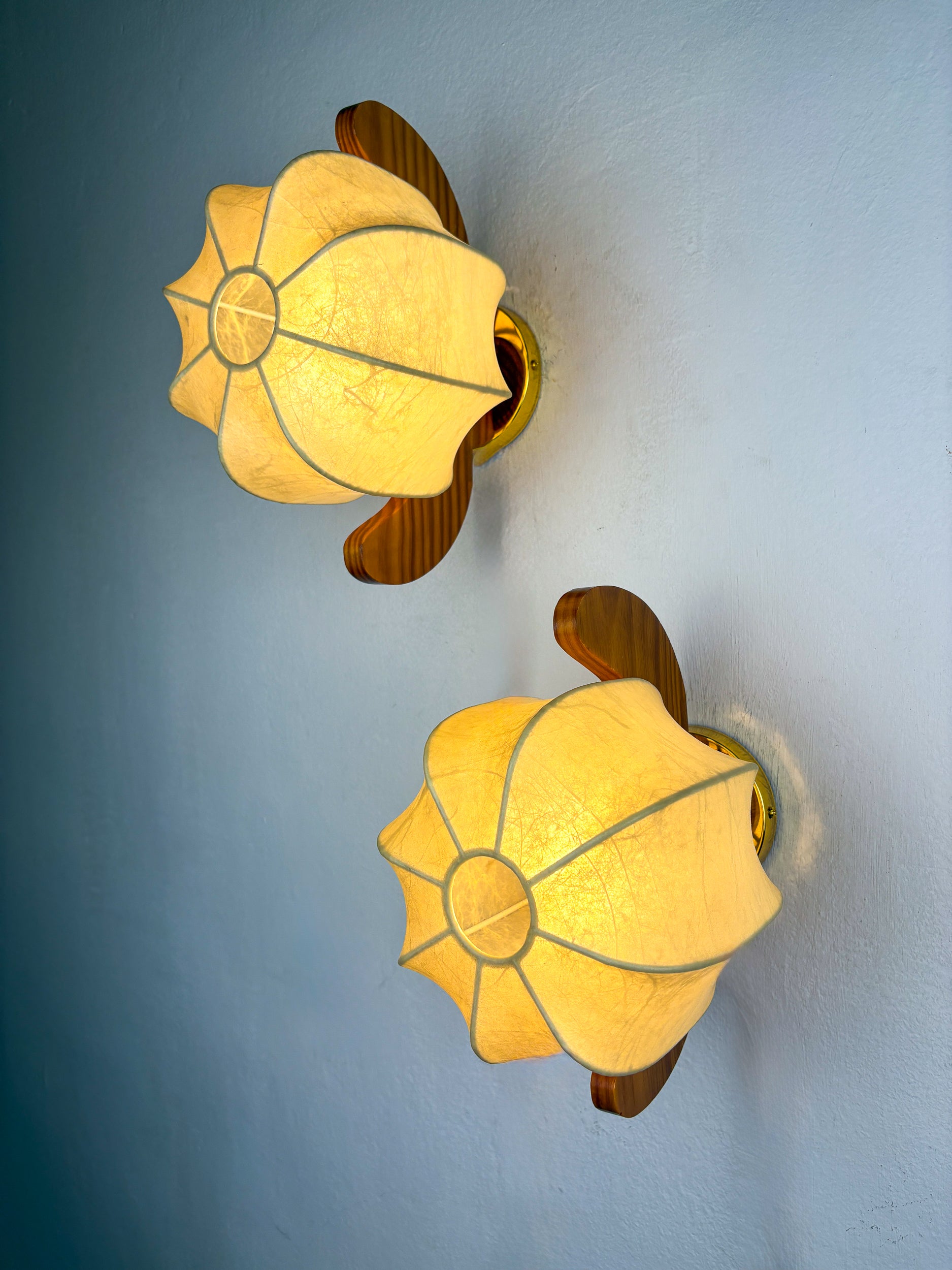Pair of "Cocoon" wall lights, resin and pine wood, Italy, 1970's