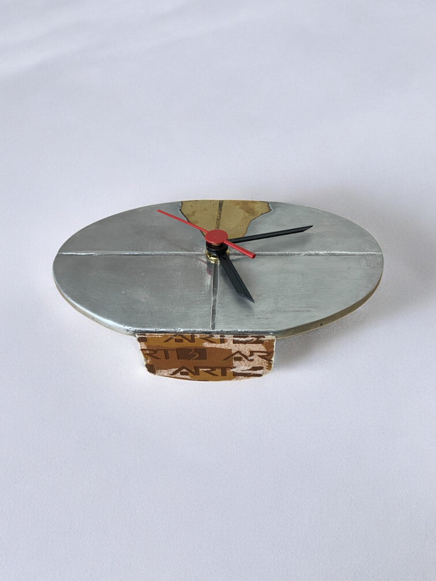 Brutalist clock by Art3, brass and aluminum, Spain, circa 1980