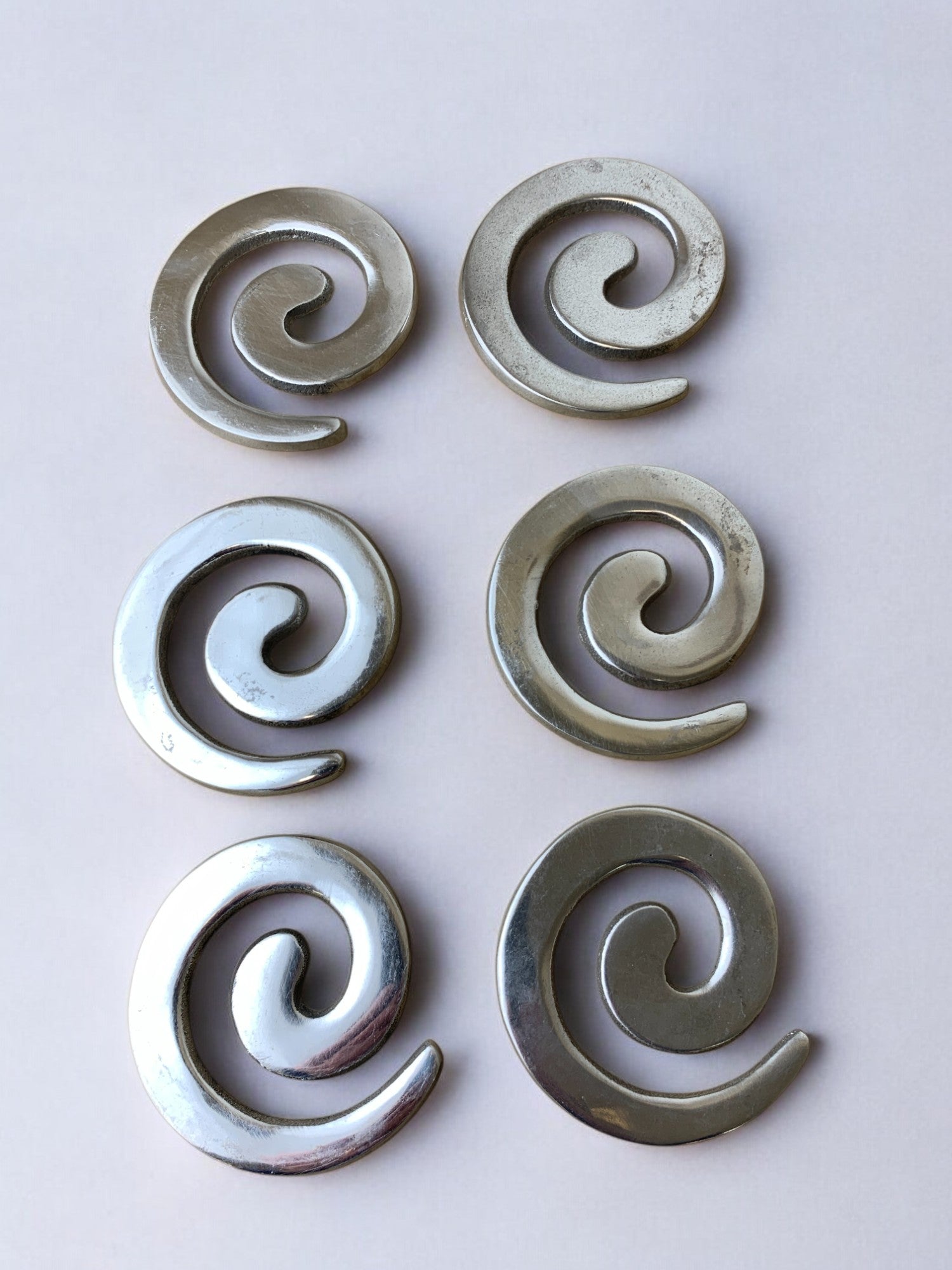Biomorphic coasters in solid Aluminium, set of 6, Spain, 1980's