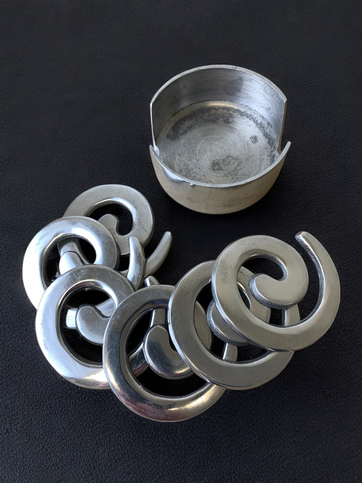 Biomorphic coasters in solid Aluminium, set of 6, Spain, 1980's