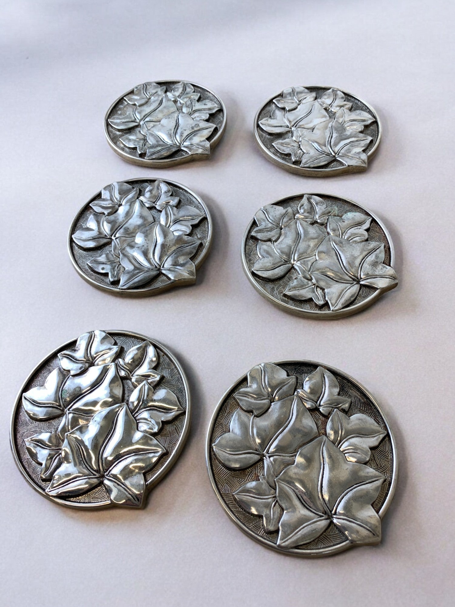 Regency Floral coasters in solid Aluminium, set of 6, Spain, 1980's