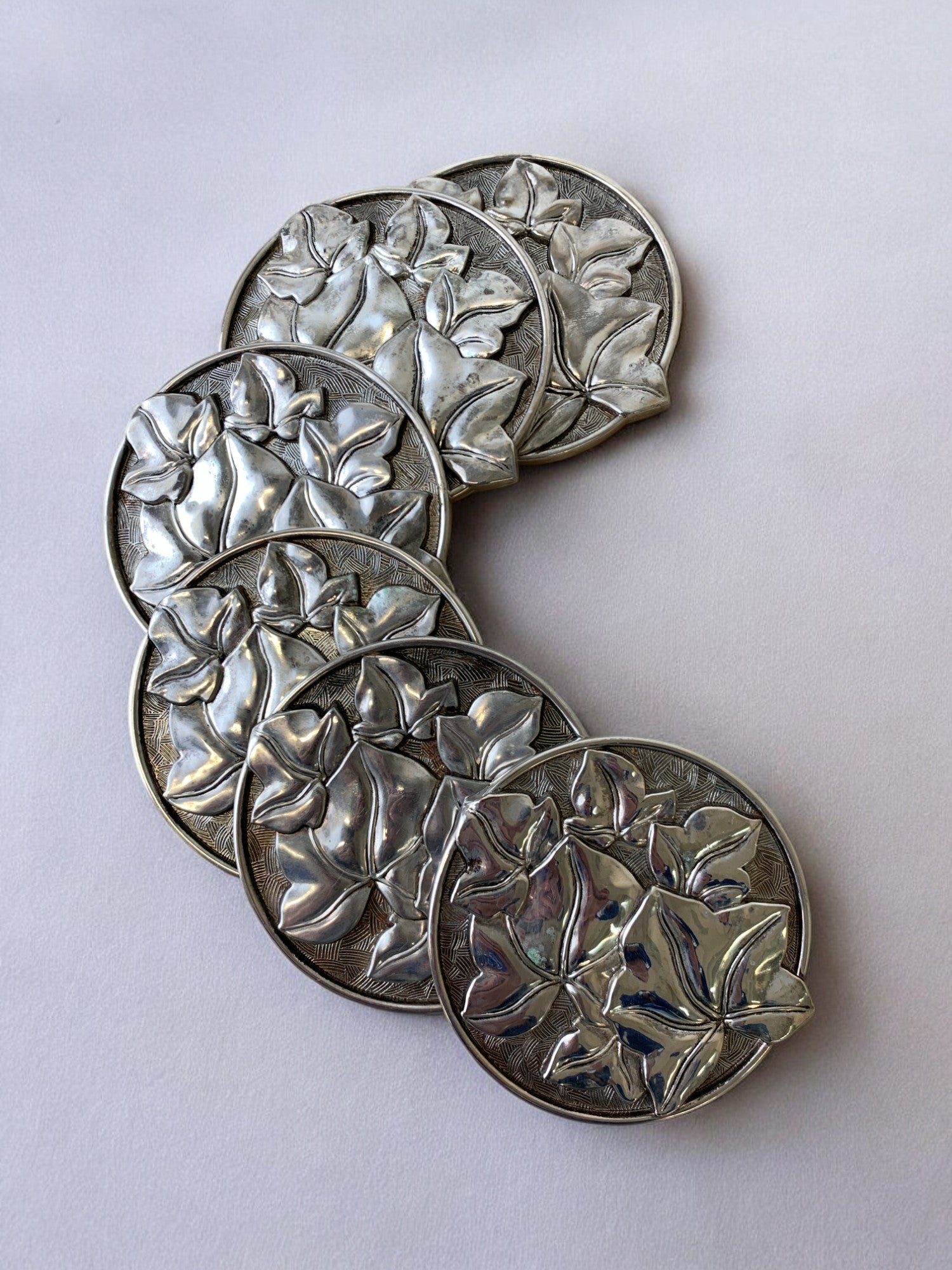 Regency Floral coasters in solid Aluminium, set of 6, Spain, 1980's