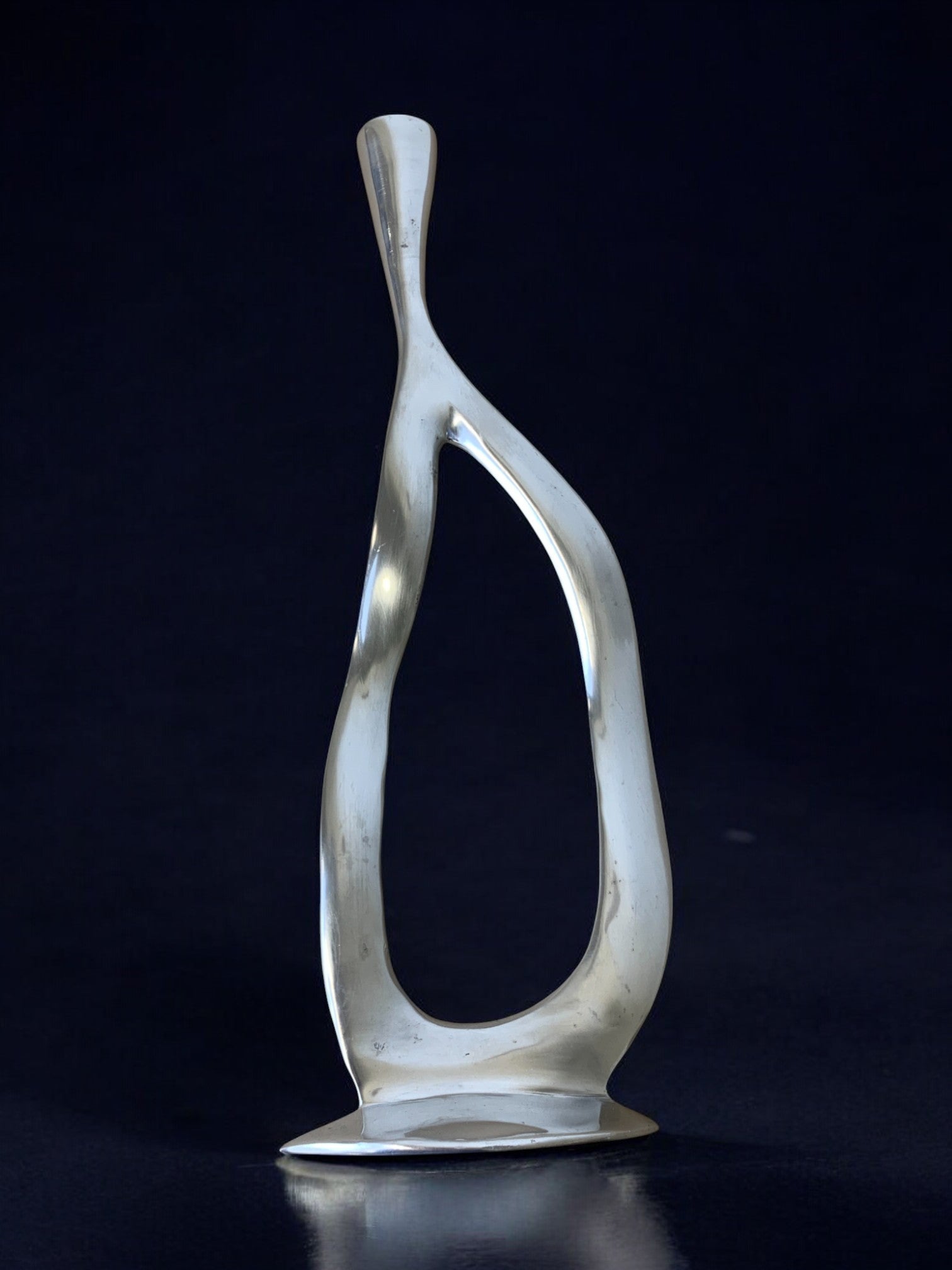Biomorphic candleholder, solid aluminum, 1970's