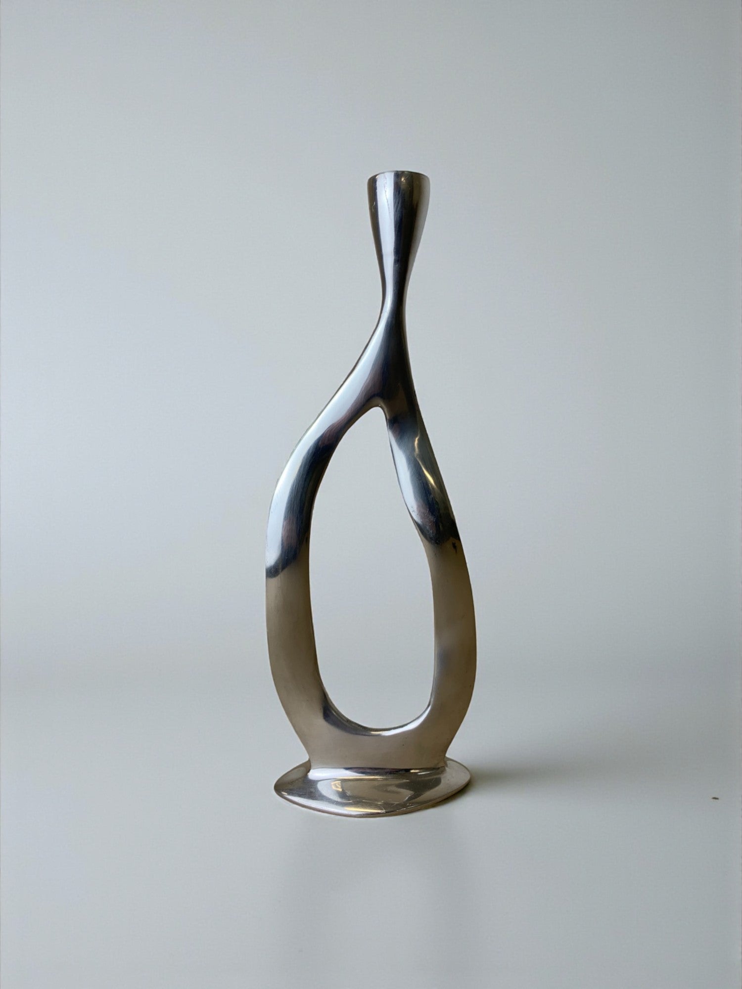 Biomorphic candleholder, solid aluminum, Spain, circa 1970