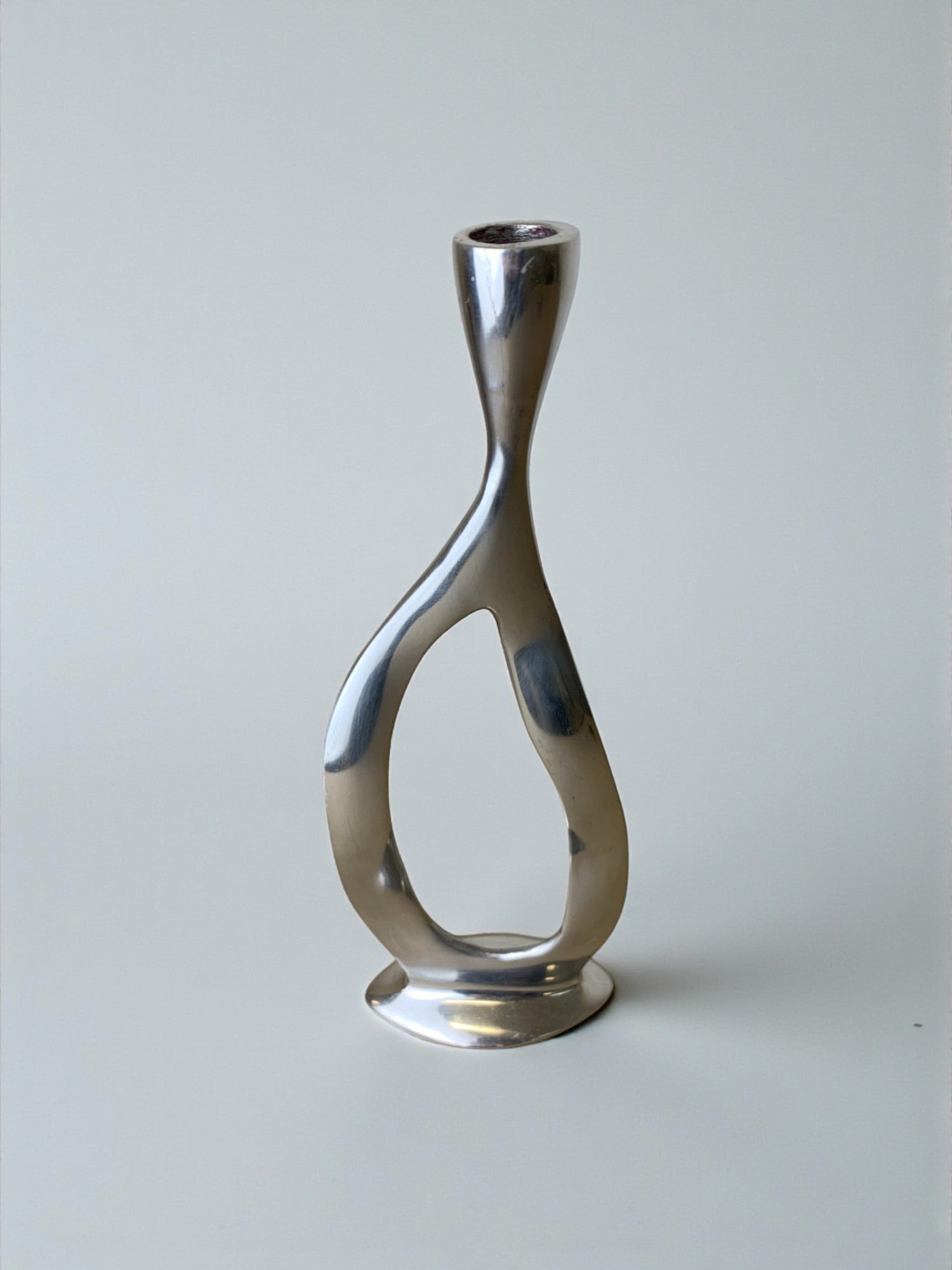 Biomorphic candleholder, solid aluminum, Spain, circa 1970