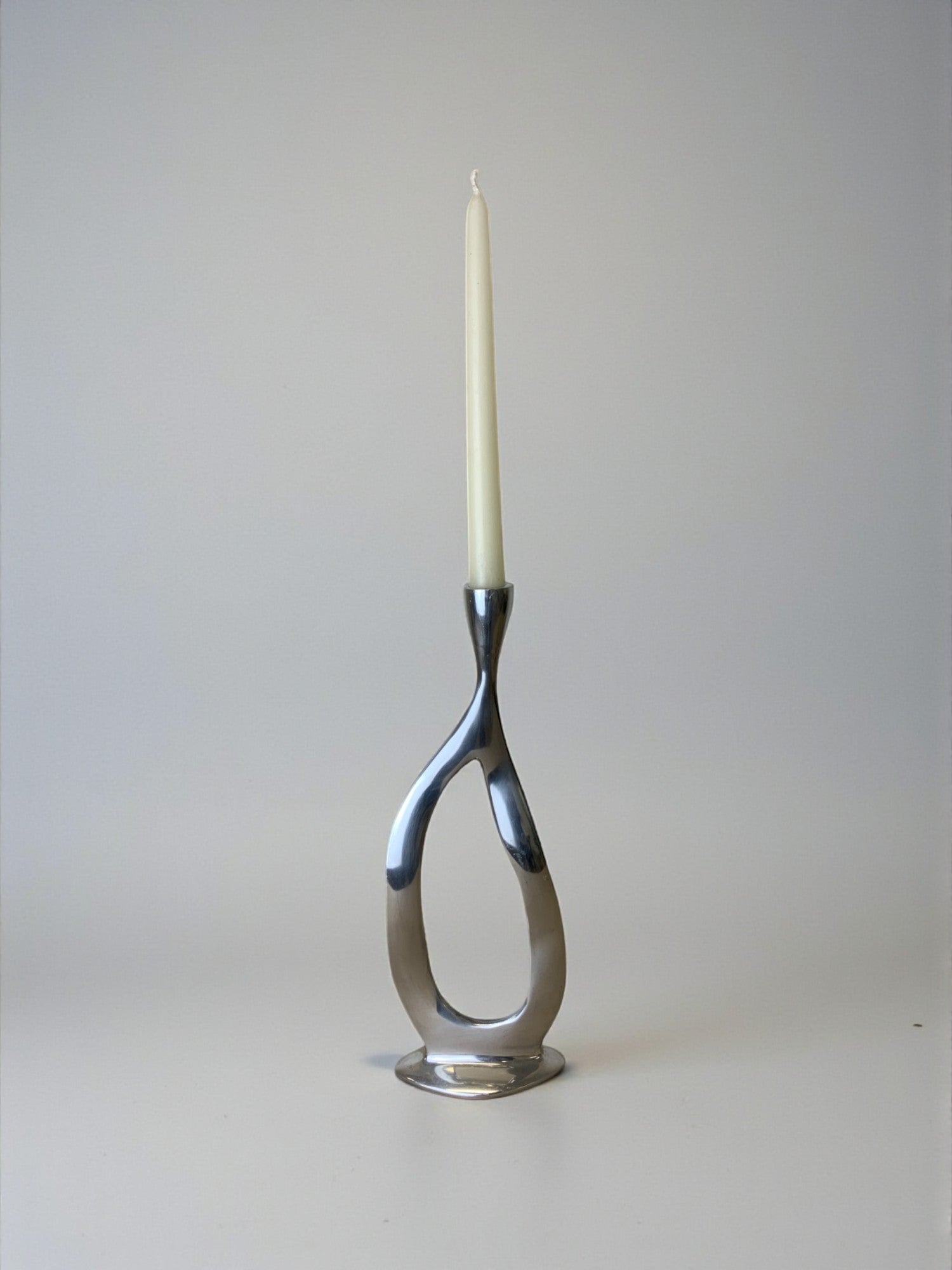 Biomorphic candleholder, solid aluminum, Spain, circa 1970