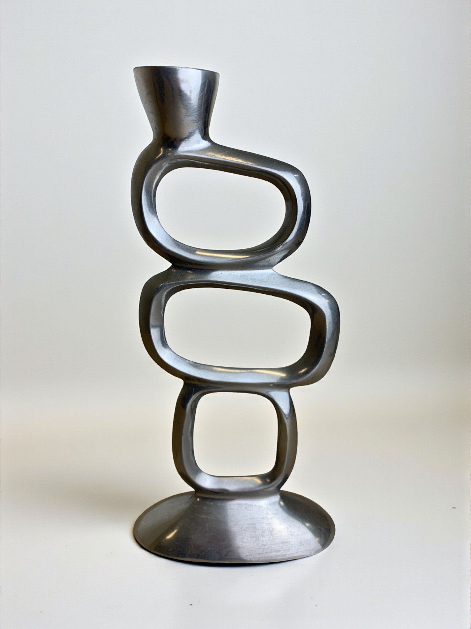Circle candlestick by matthew hilton, solid aluminium, Circa 1980's