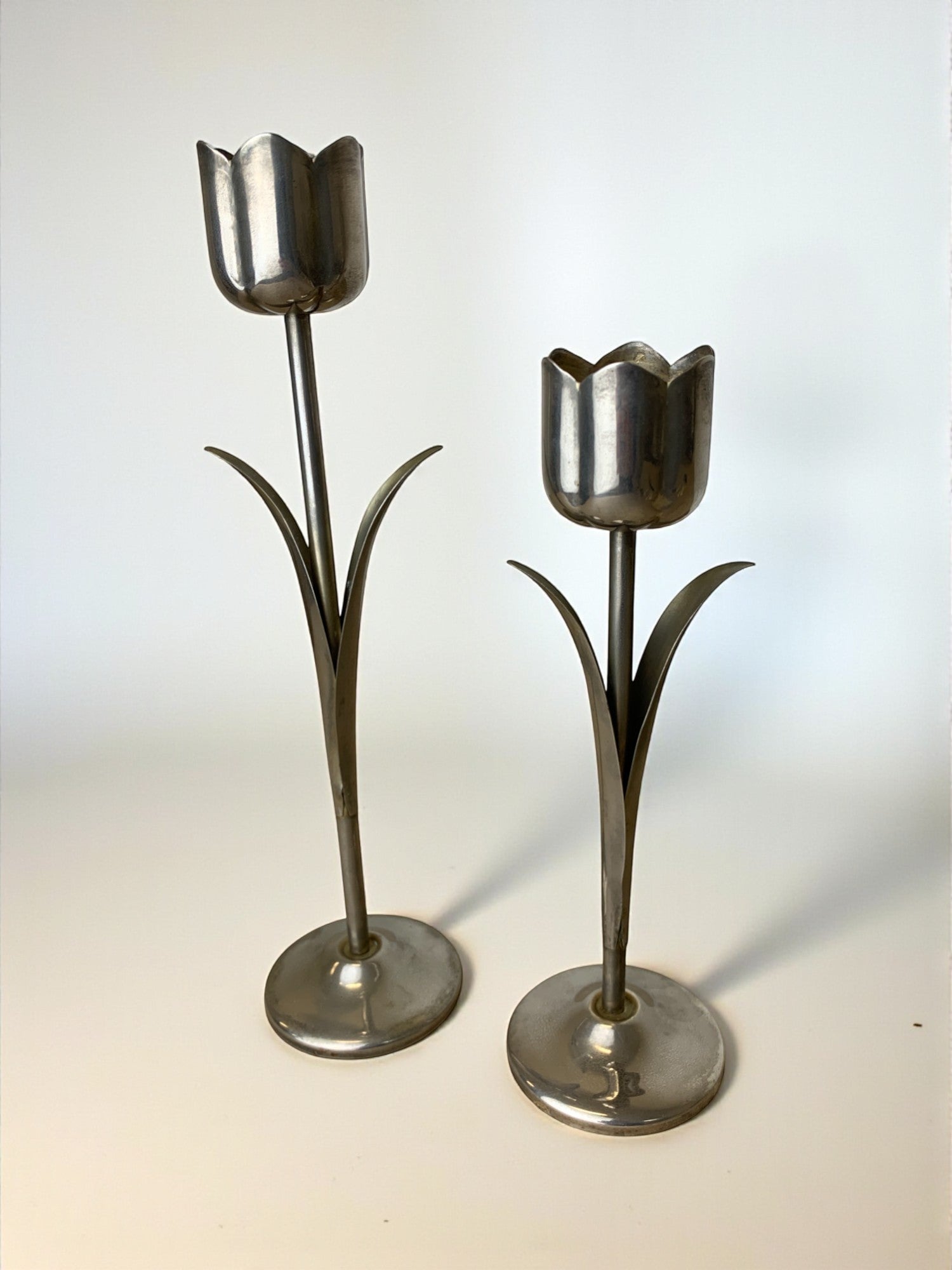 Pair of chromed tulip candle holders, 1970's, Italy