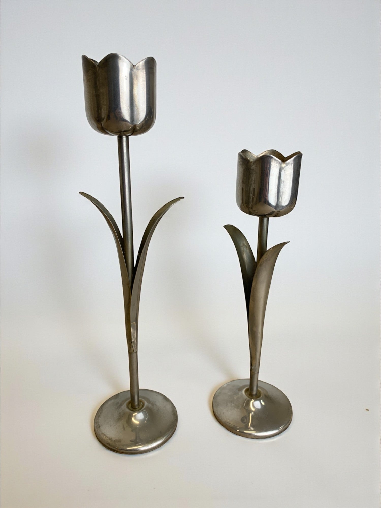 Pair of chromed tulip candle holders, 1970's, Italy