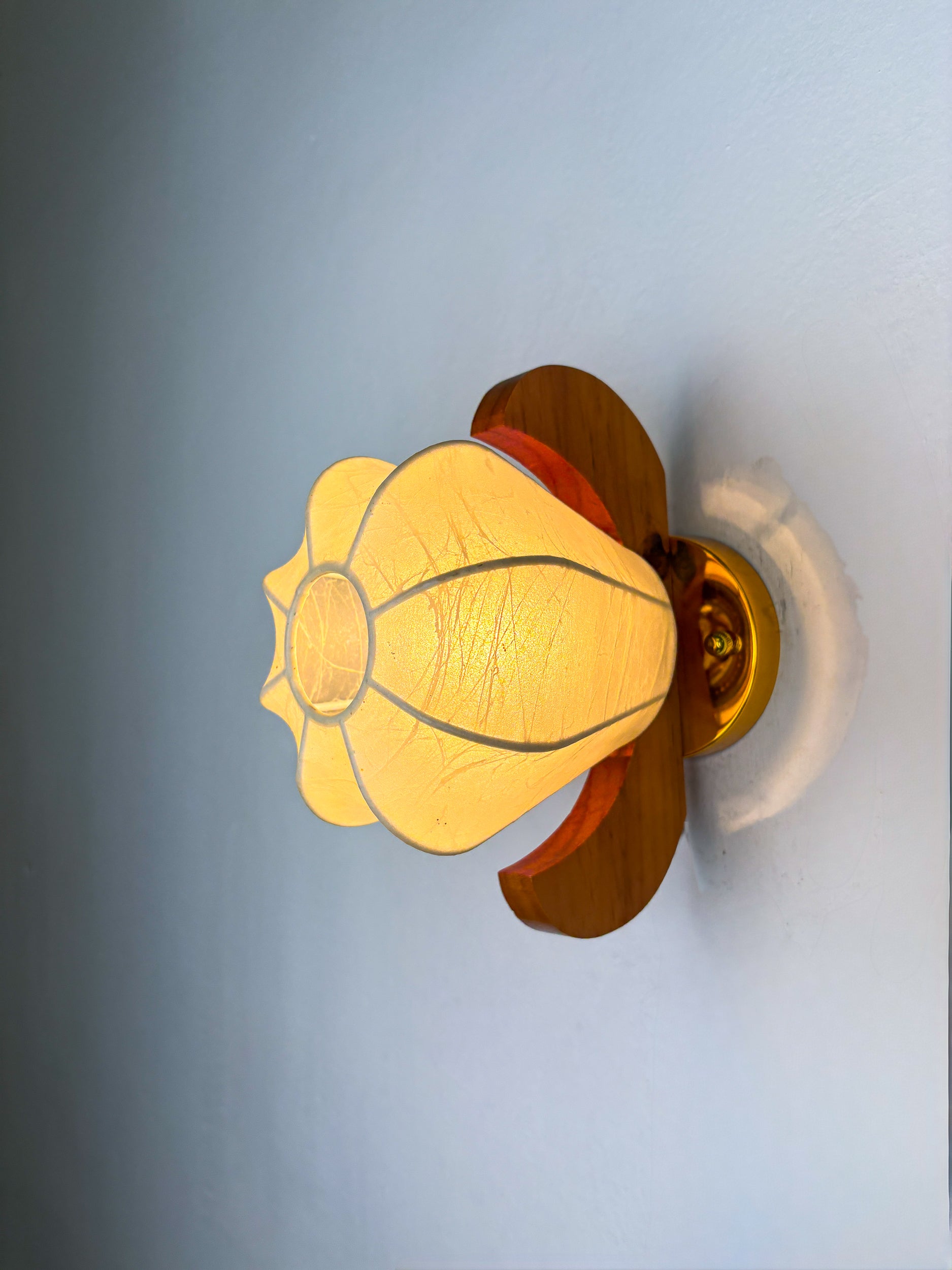 Pair of Pear-shaped "Cocoon" wall sconces, resin and pine wood, Italy, Circa 1970's