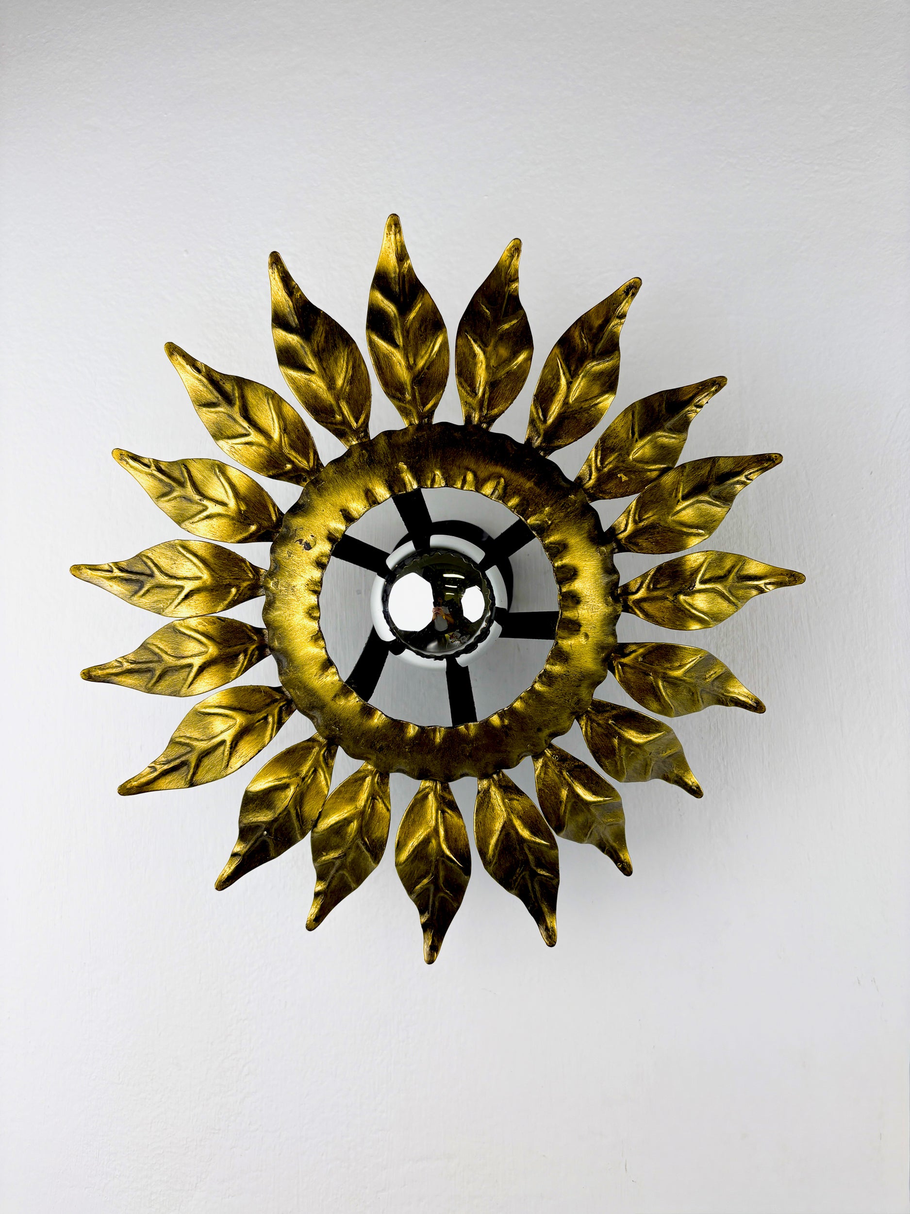 Sunburst ceiling light fixture or sconce in Gilt Wrought Iron, Spain, Circa 1960's