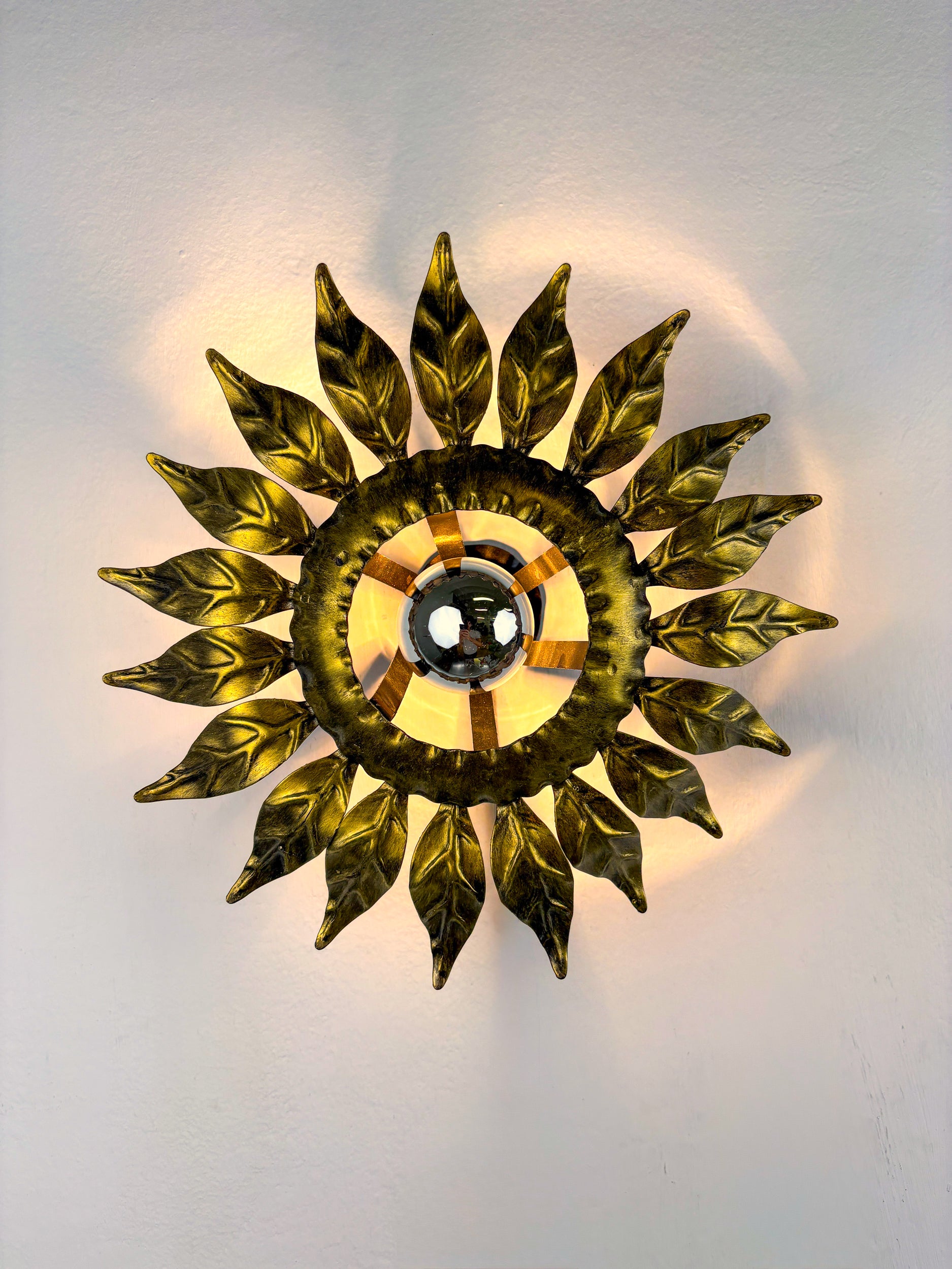 Sunburst ceiling light fixture or sconce in Gilt Wrought Iron, Spain, Circa 1960's