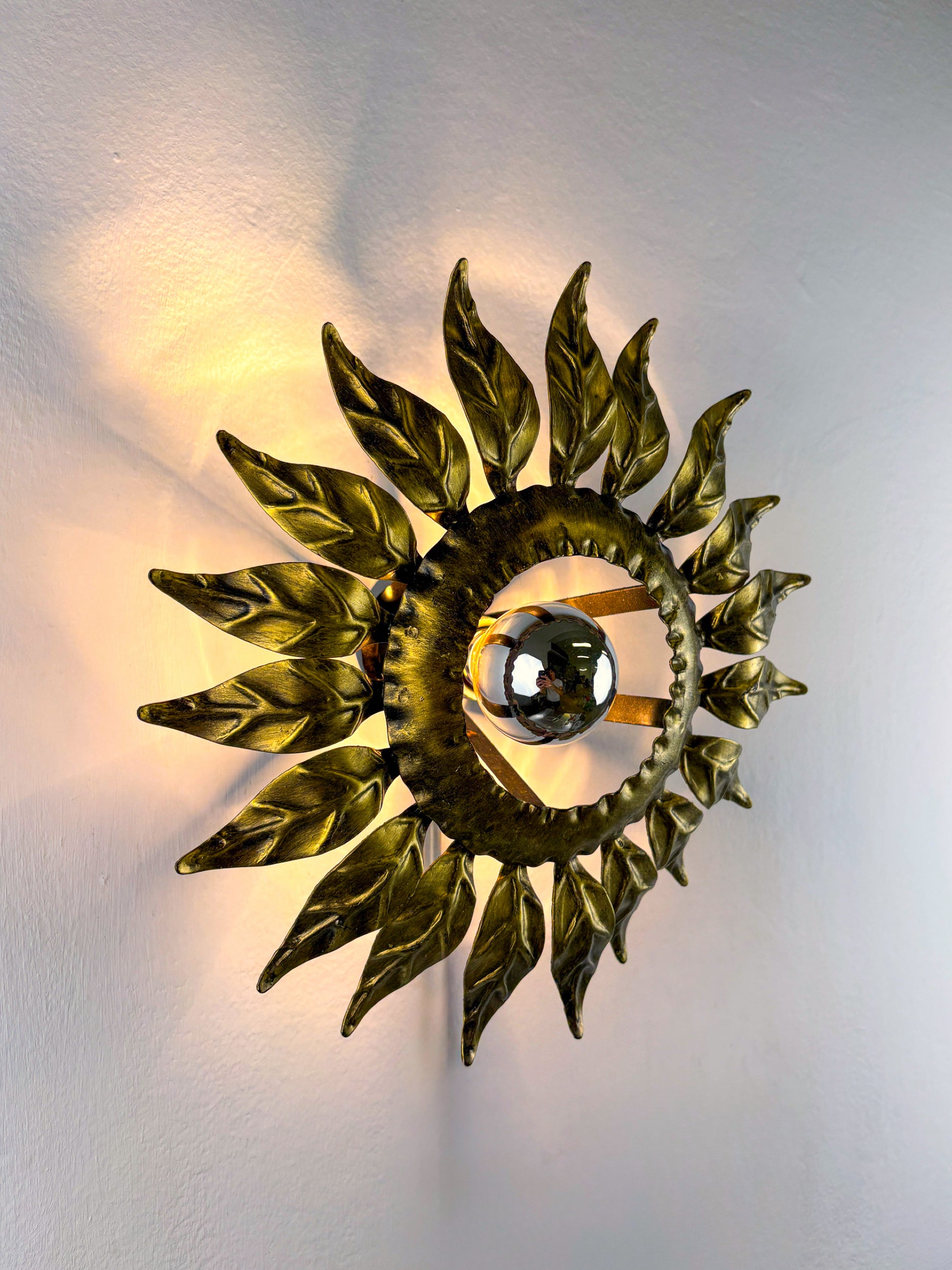 Sunburst ceiling light fixture or sconce in Gilt Wrought Iron, Spain, Circa 1960's