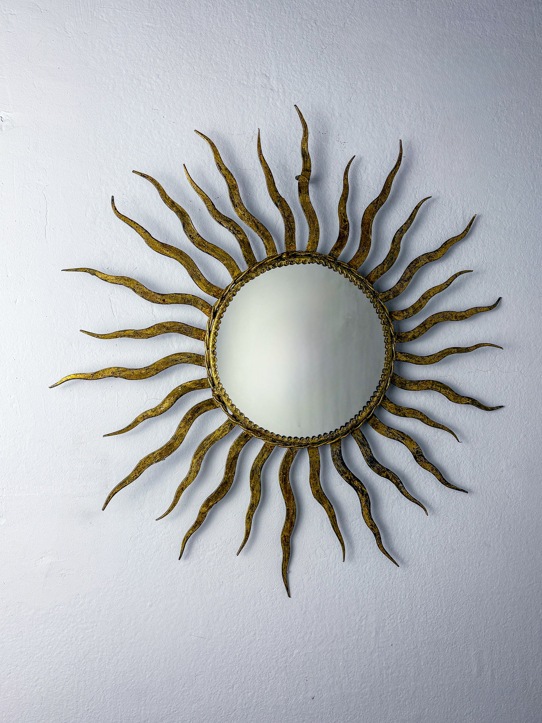 French Sunburst Starburst Mirror in Gilt Iron, 1950's