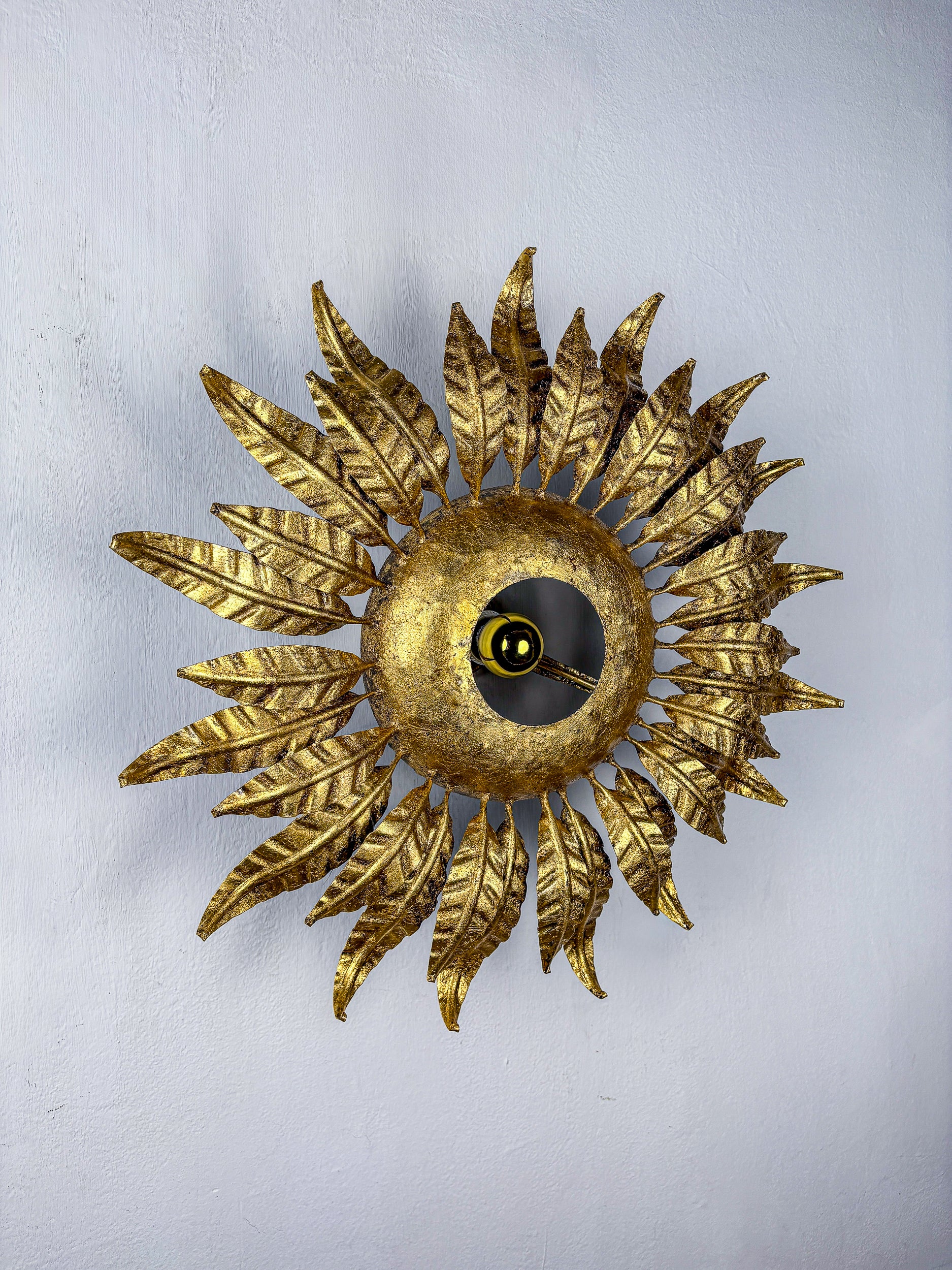 Spanish Sunburst ceiling light fixture or sconce in Gilt Wrought Iron, Circa 1950's