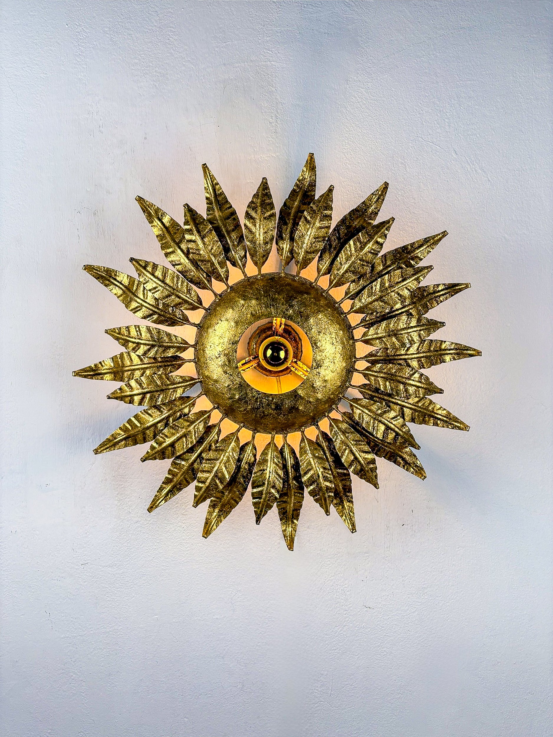 Spanish Sunburst ceiling light fixture or sconce in Gilt Wrought Iron, Circa 1950's