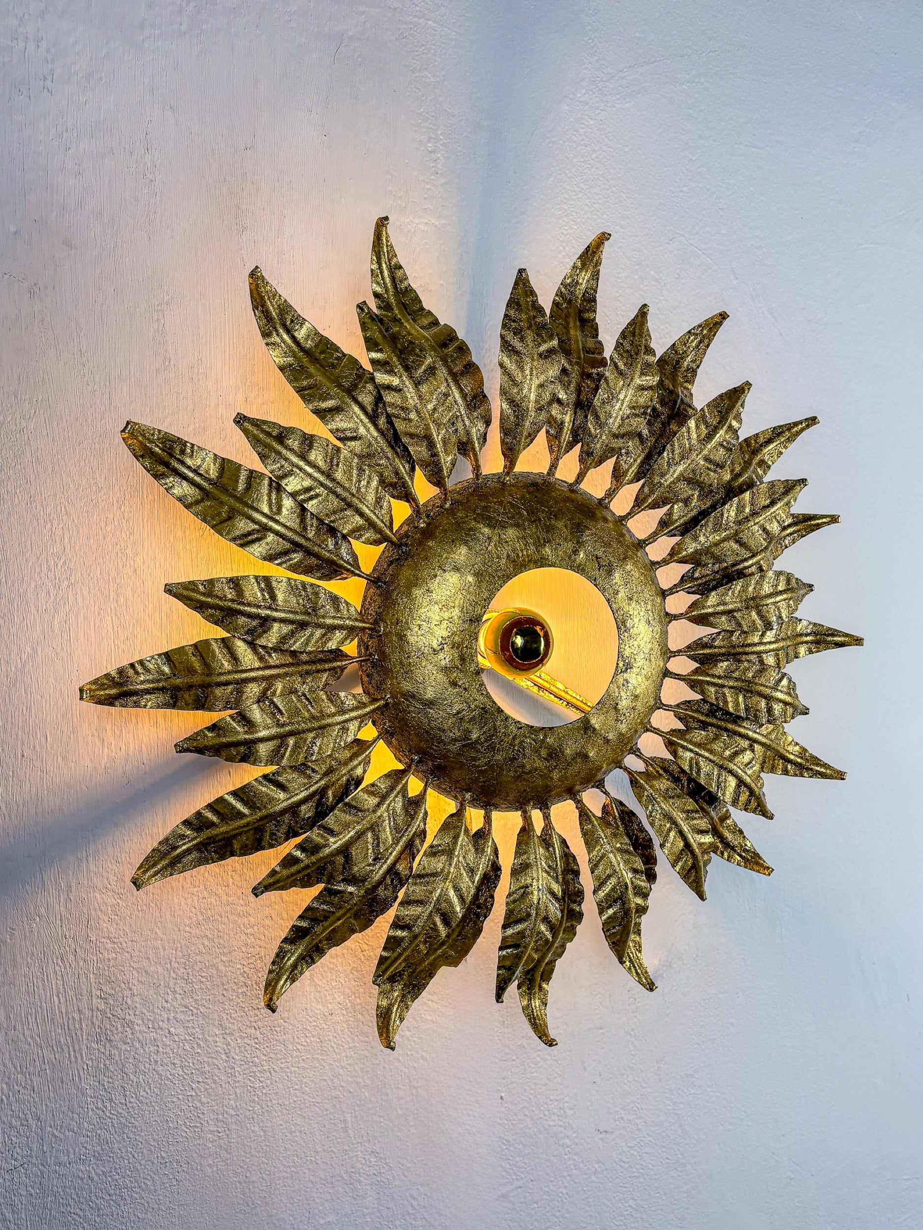 Spanish Sunburst ceiling light fixture or sconce in Gilt Wrought Iron, Circa 1950's