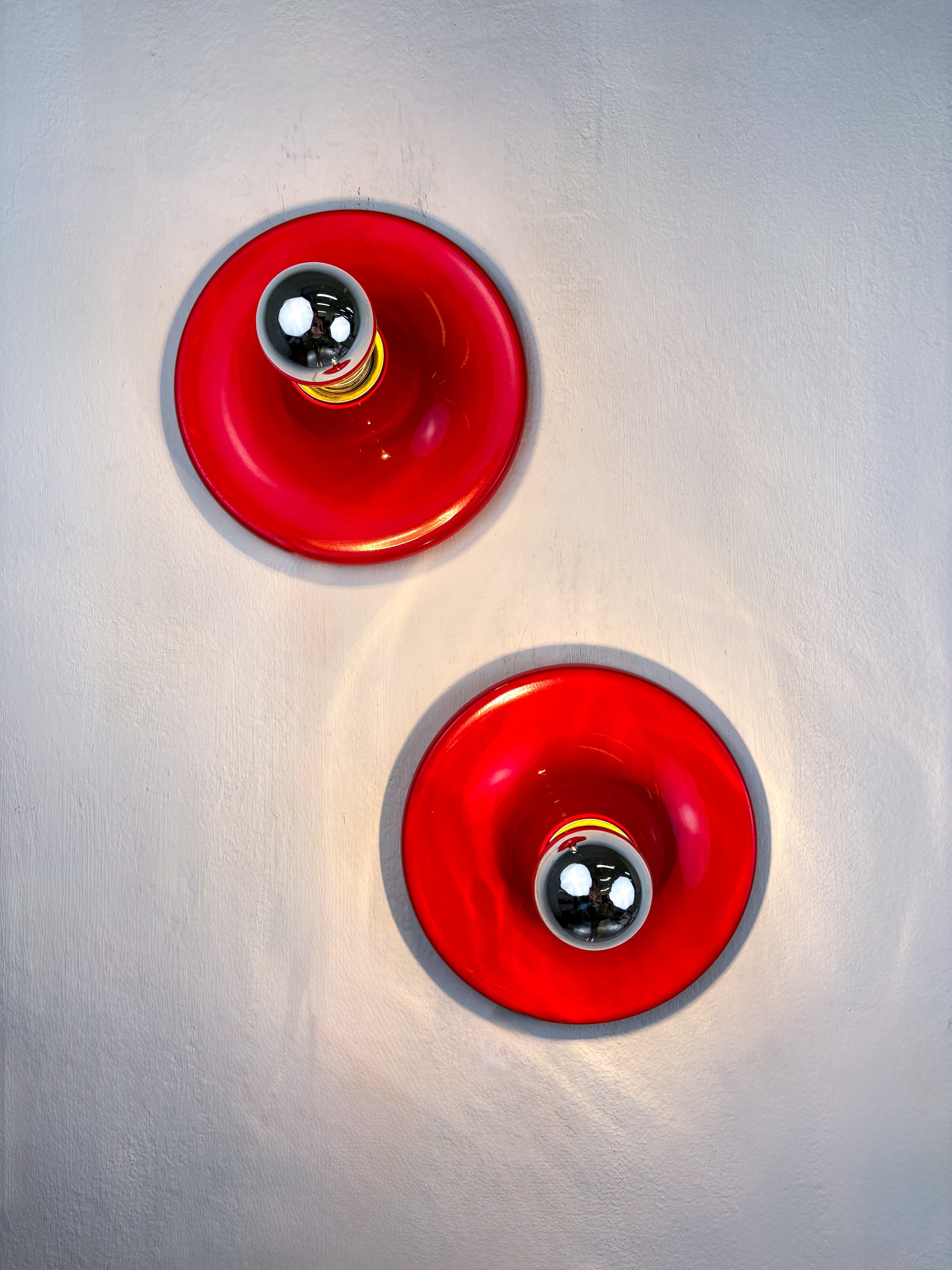 Pair of red Targetti Sankey sconces, 1970s, Italy