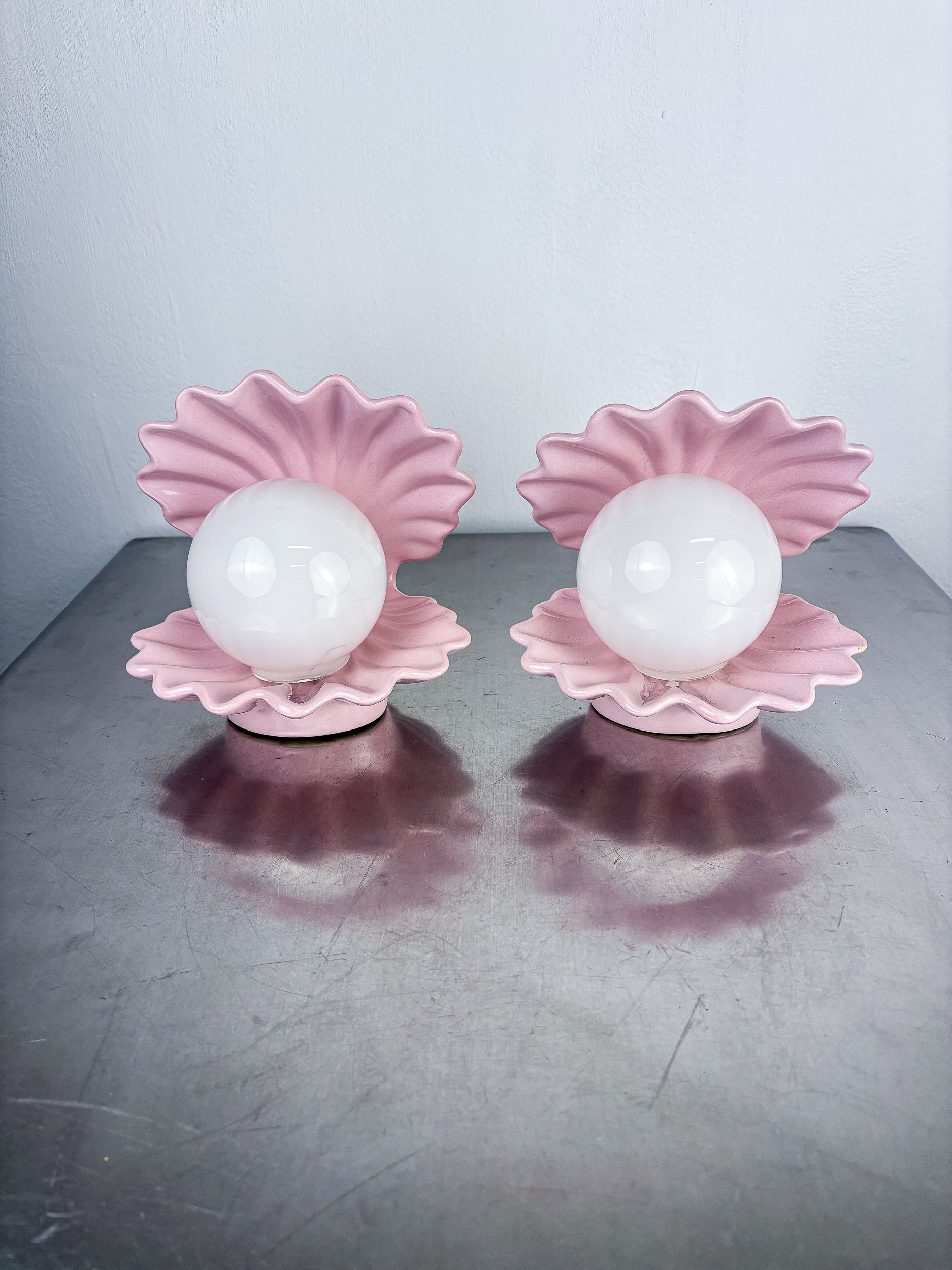 Pair of pink ceramic shell-shaped table lamps, Italy, 1970s