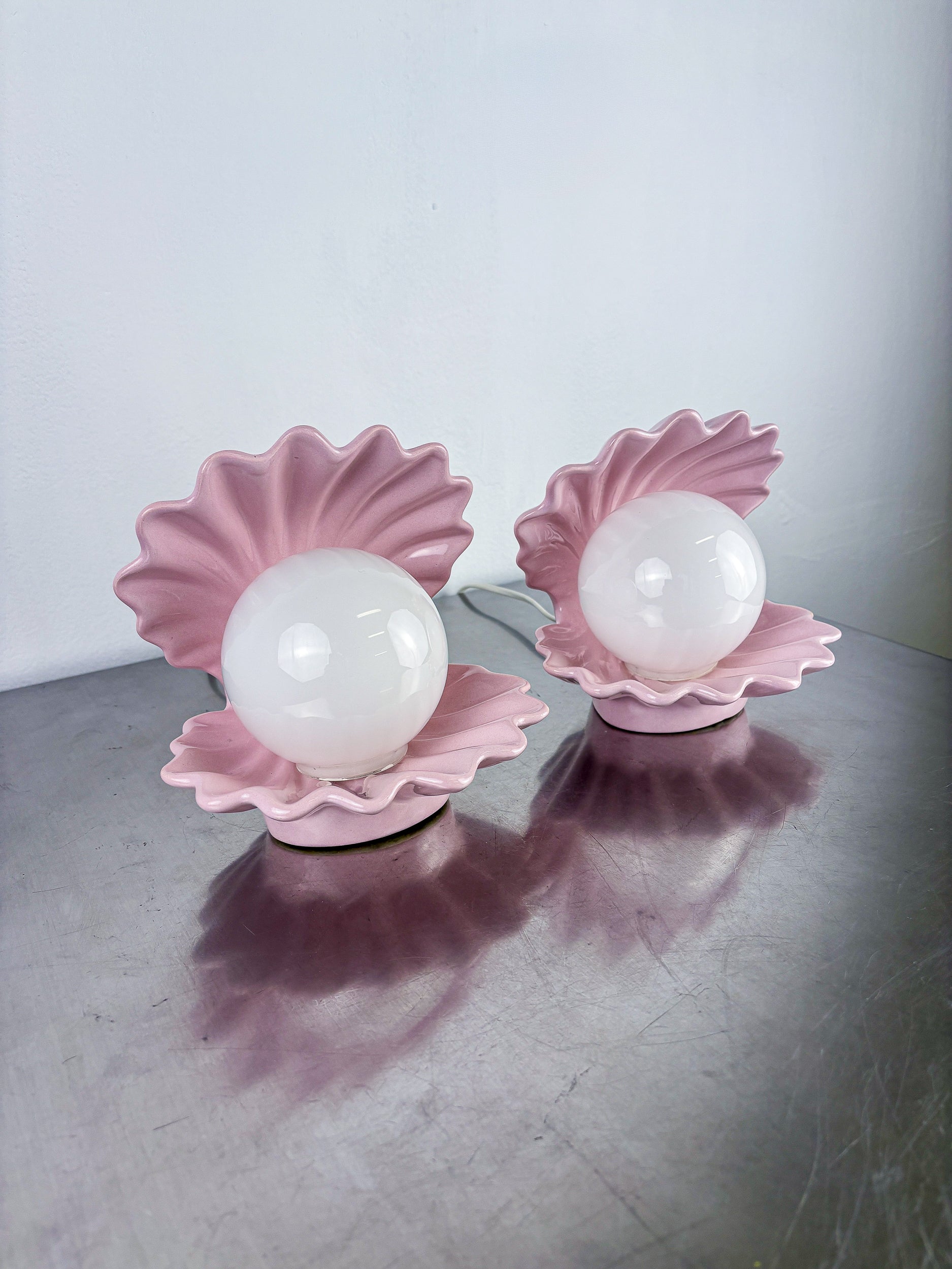 Pair of pink ceramic shell-shaped table lamps, Italy, 1970s