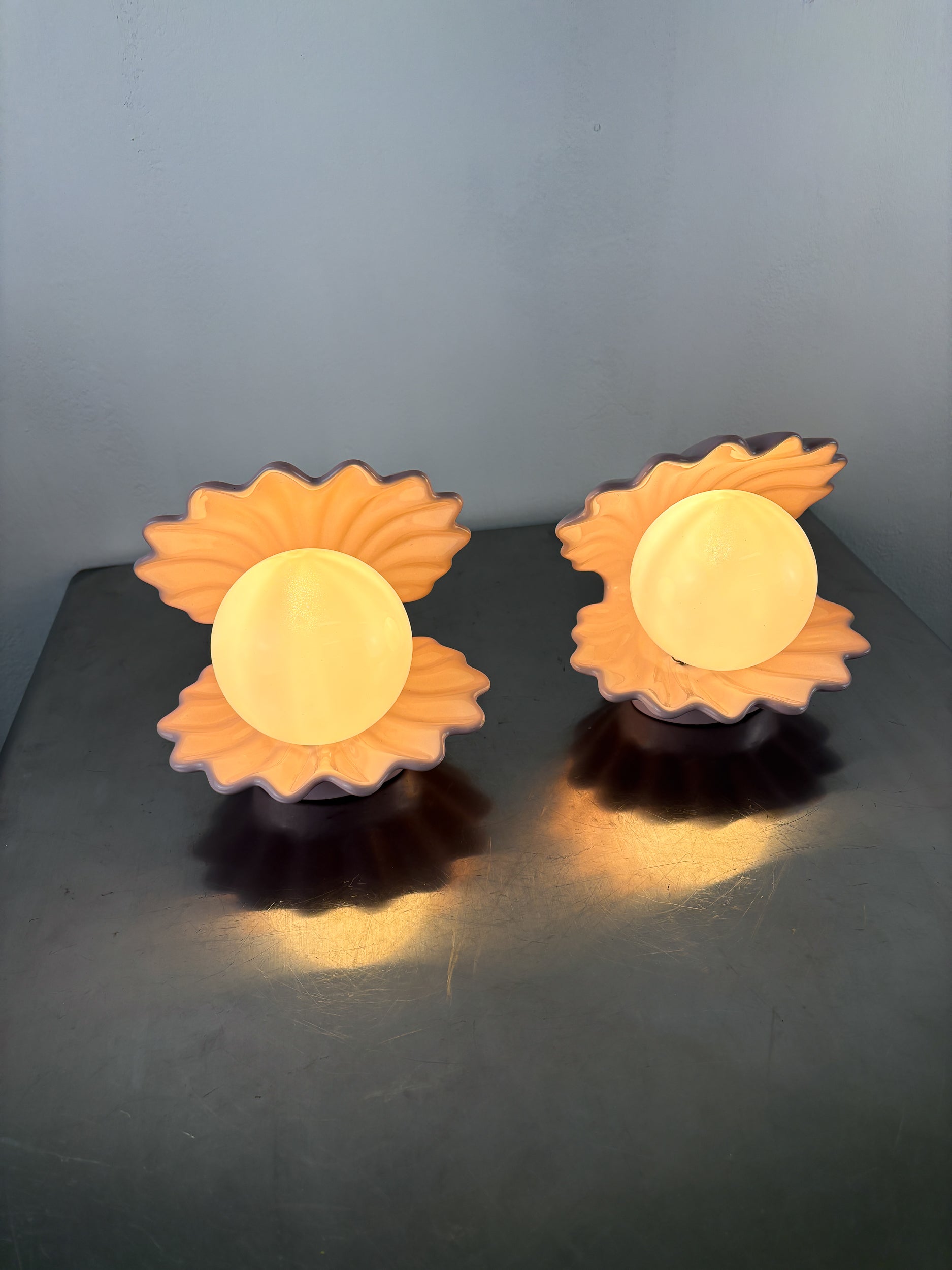 Pair of pink ceramic shell-shaped table lamps, Italy, 1970s