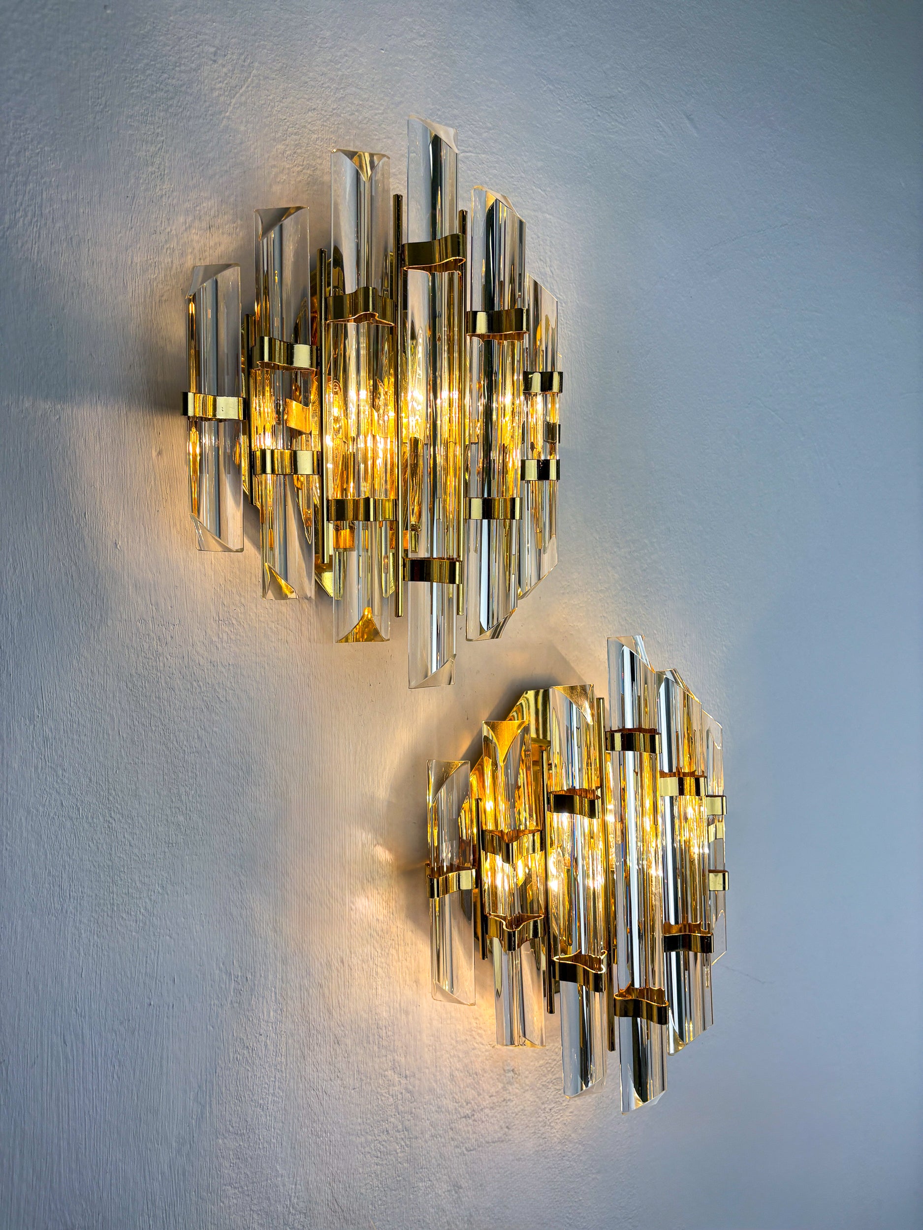 Pair of Venini sconces, Triedi cut Glass, Italy, Circa 1970's