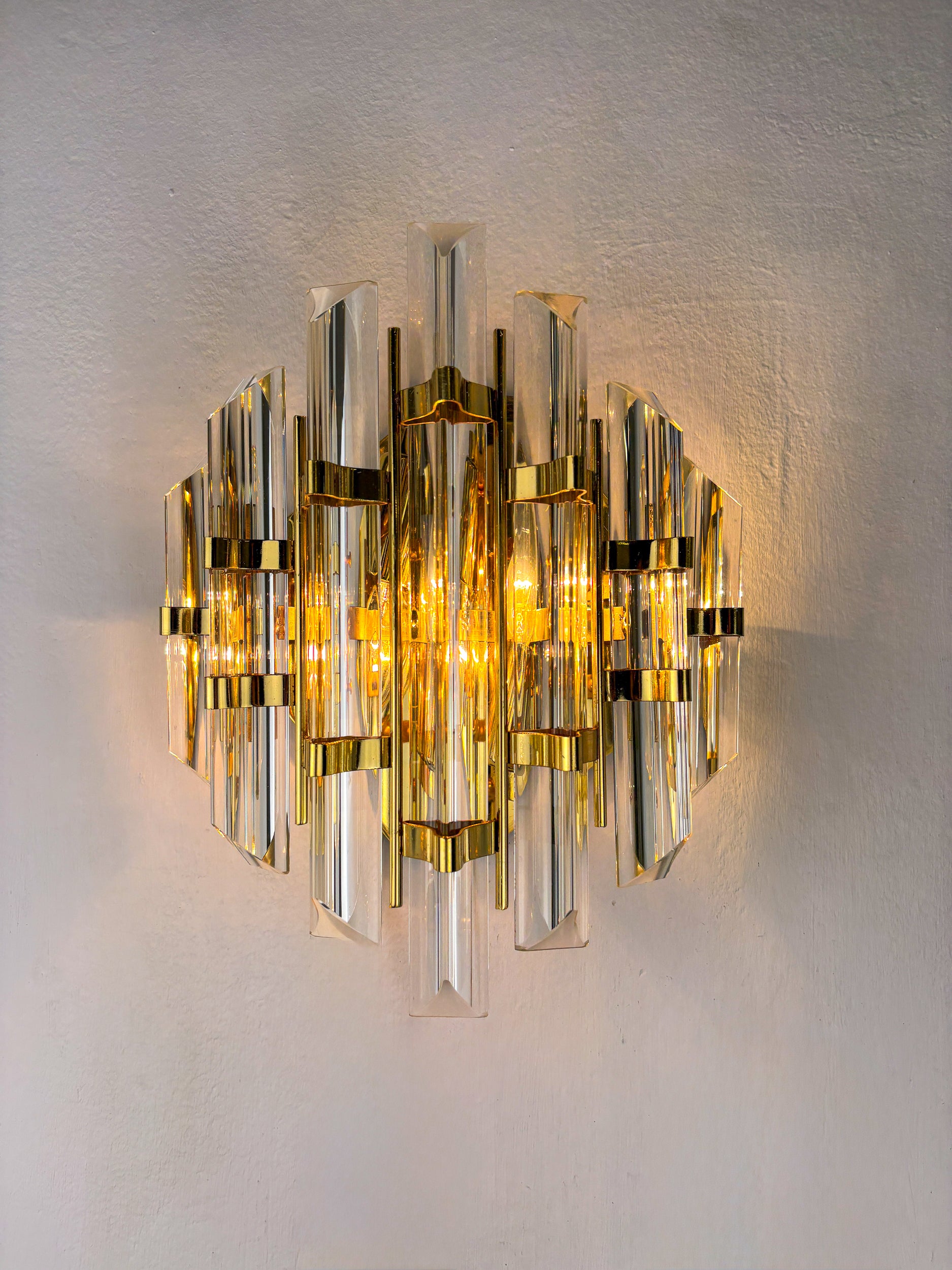 Pair of Venini sconces, Triedi cut Glass, Italy, Circa 1970's