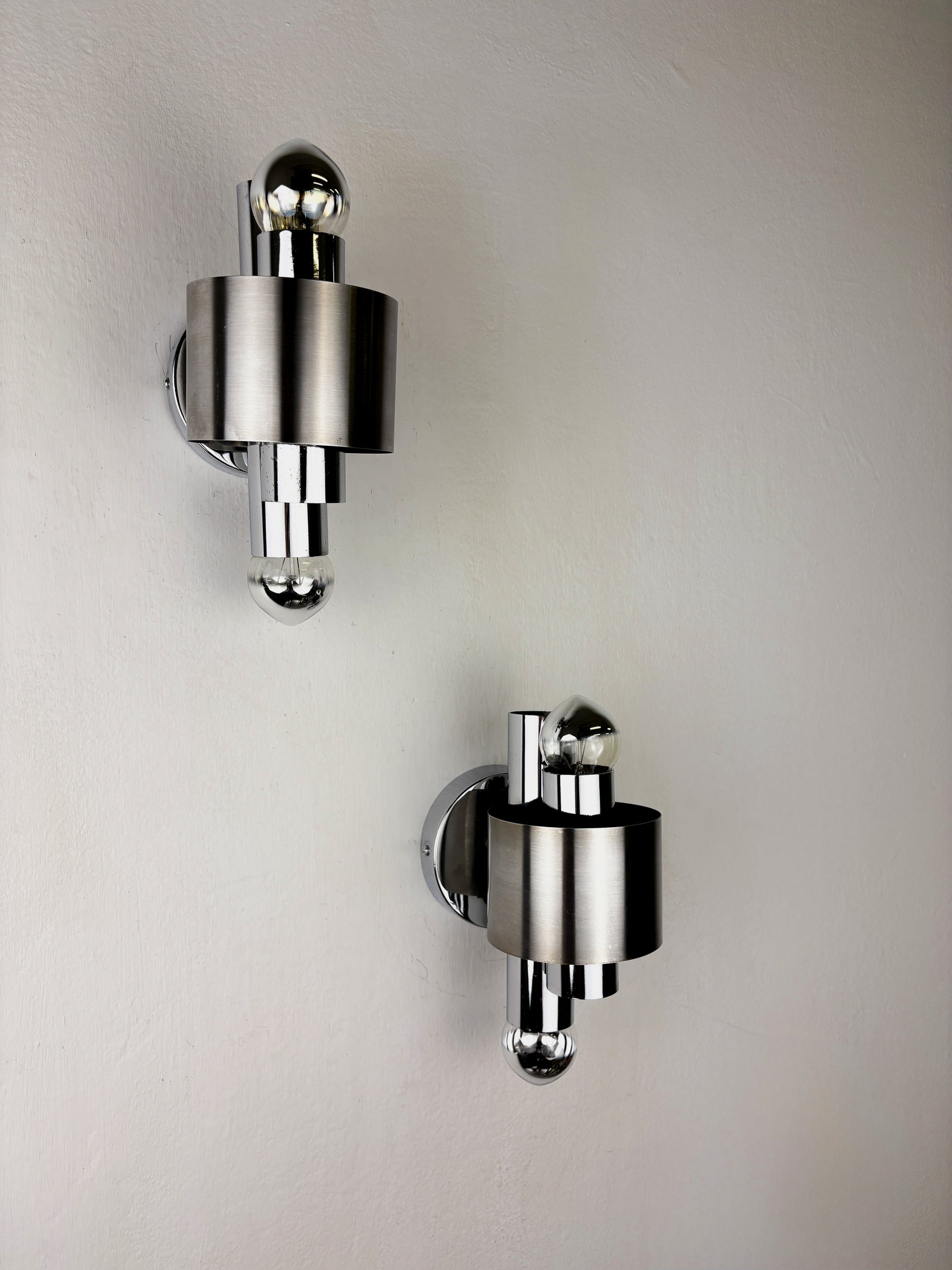 Pair of space age 2-light wall sconces, chromed metal, Italy, 1970's