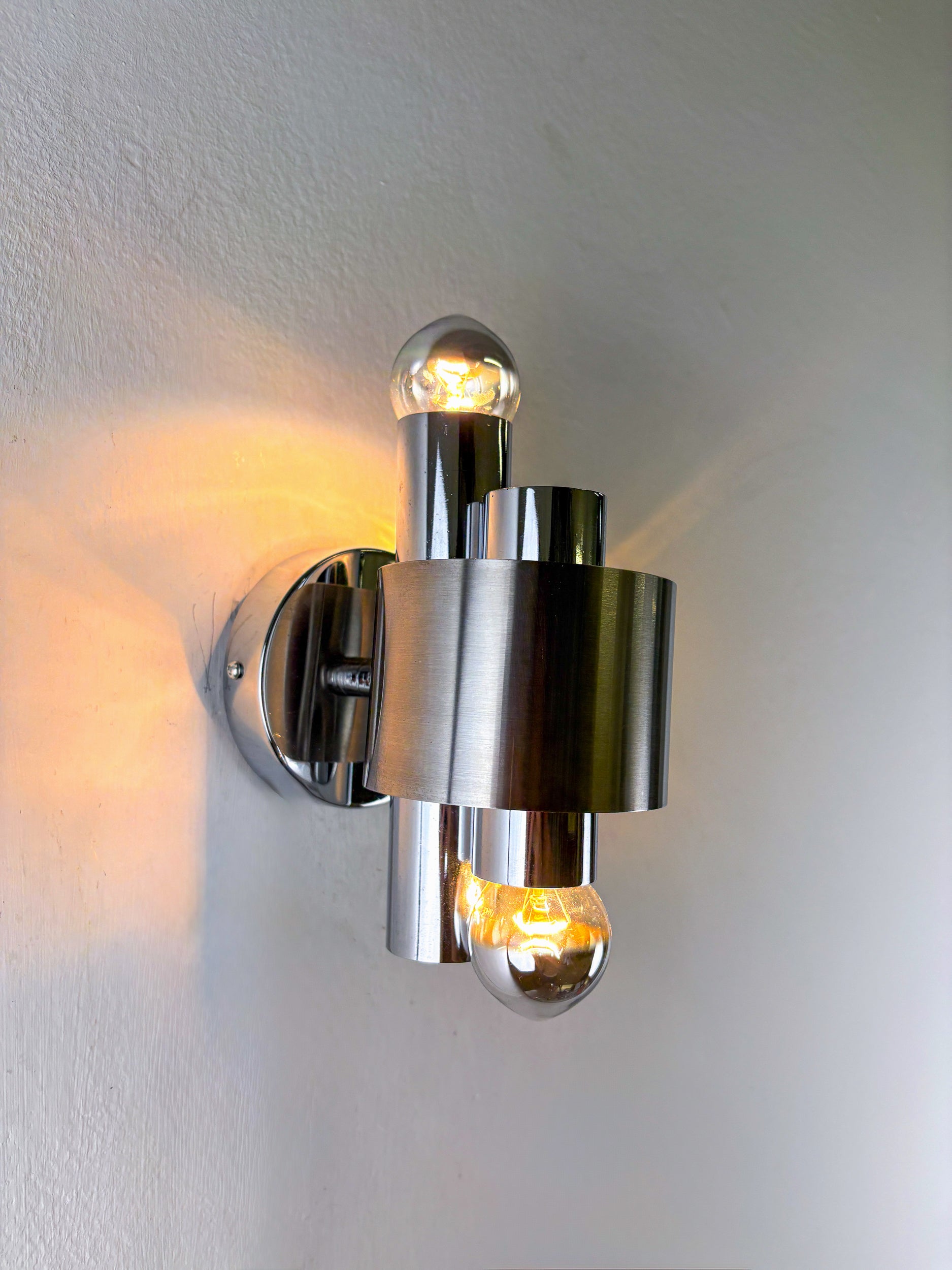 Pair of space age 2-light wall sconces, chromed metal, Italy, 1970's