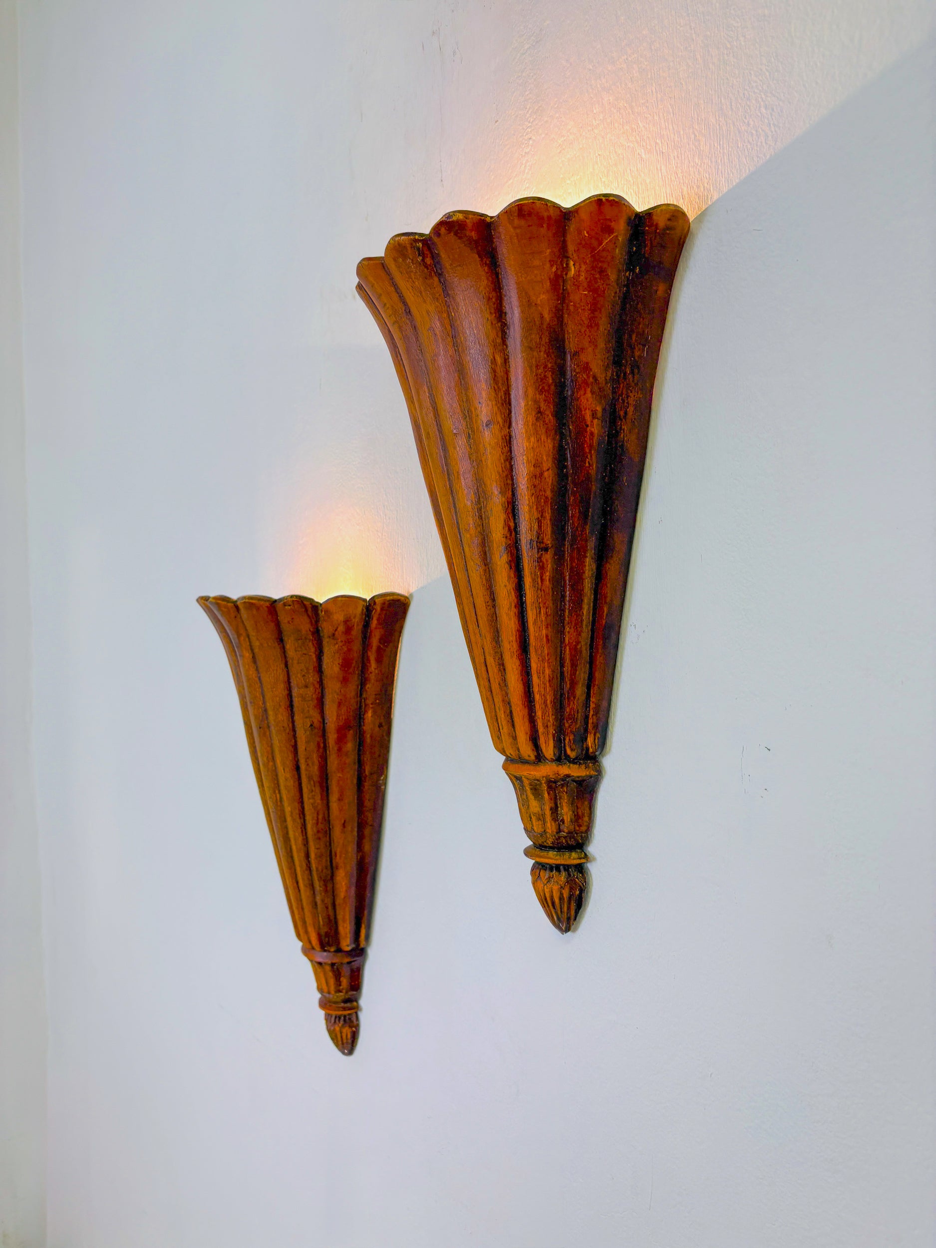 Pair of Art Deco carved wood wall sconces, France, 1930's