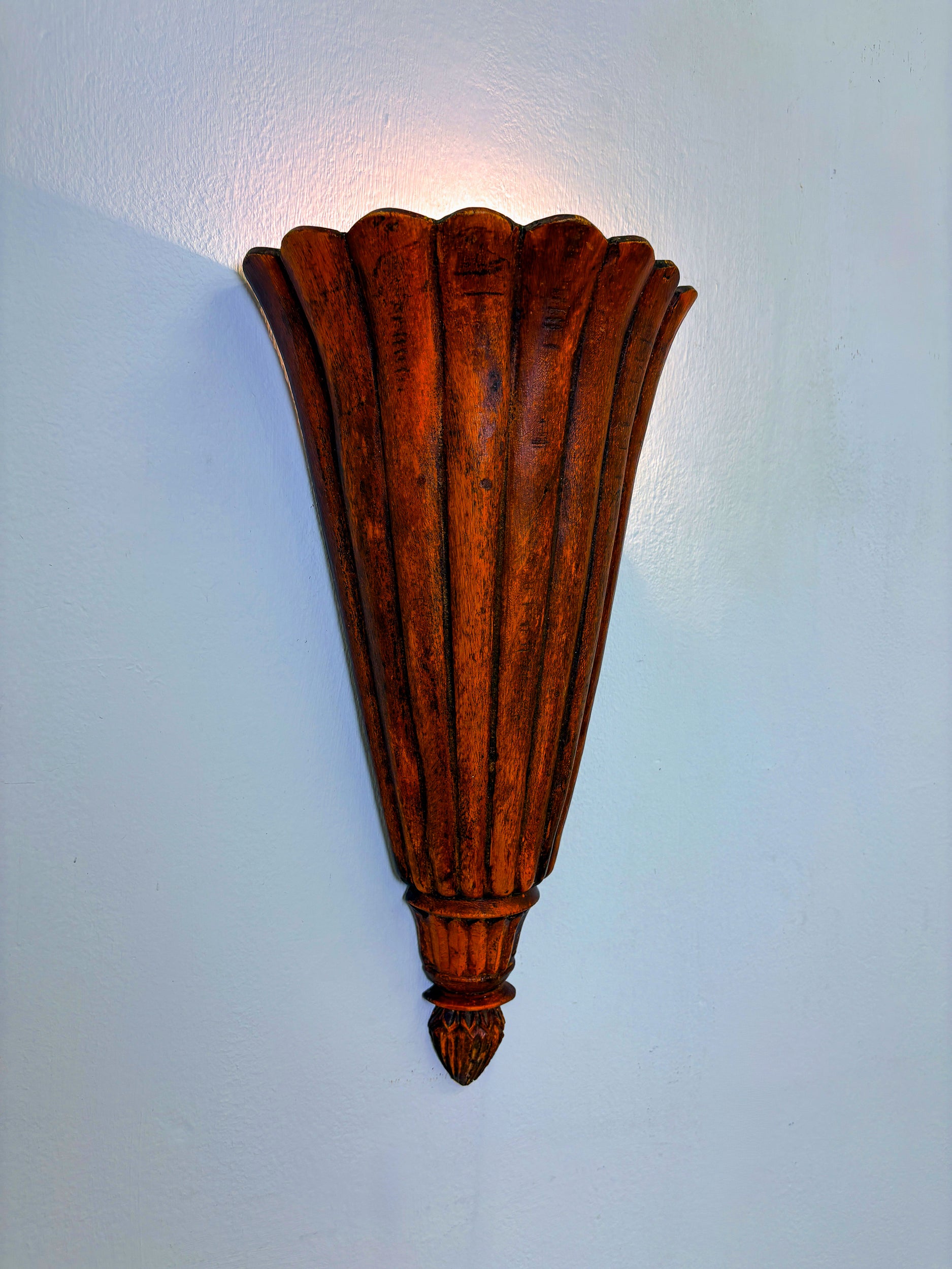 Pair of Art Deco carved wood wall sconces, France, 1930's
