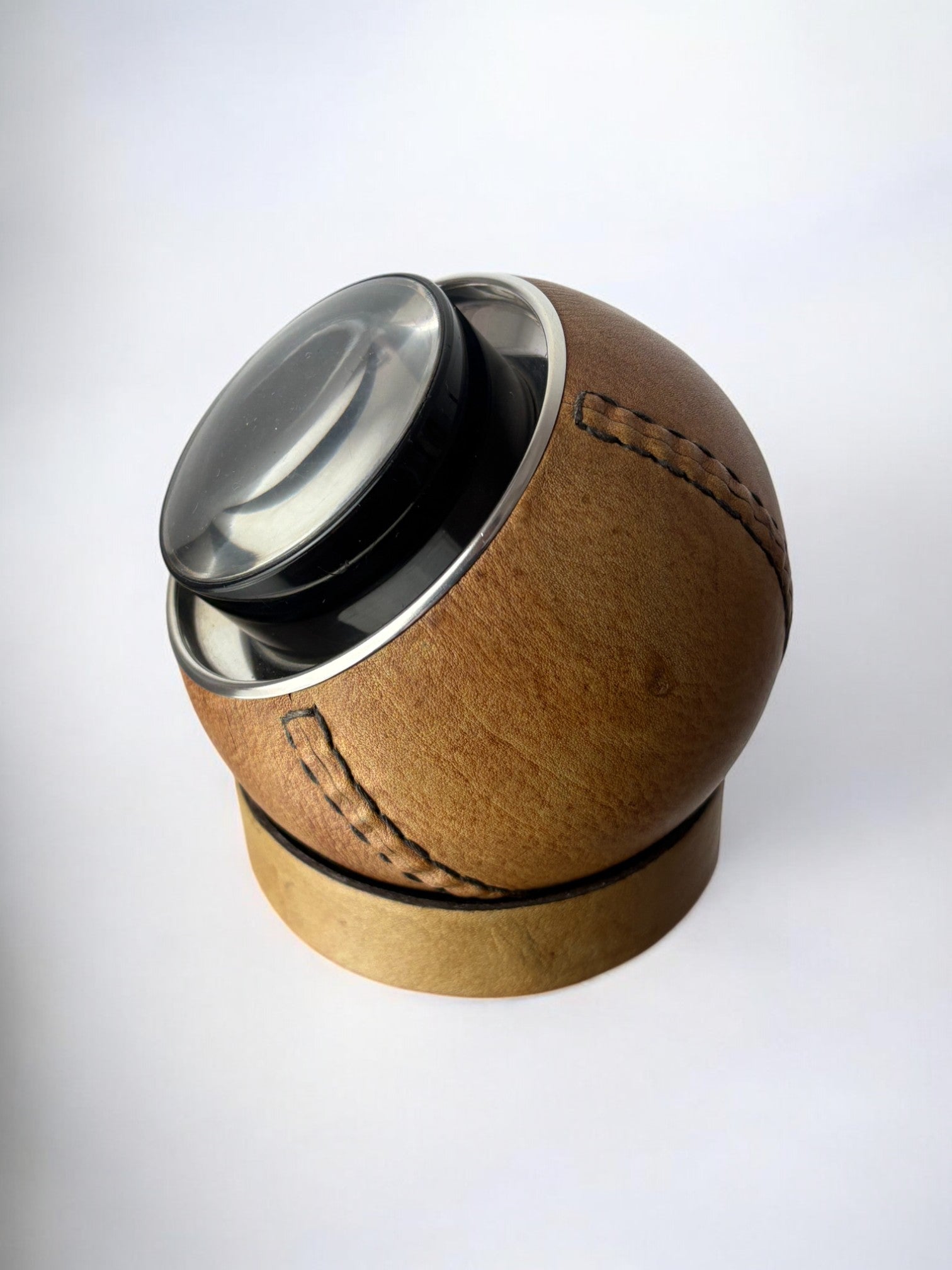 Circular cigarette box with support in leather, Spain, 1980's