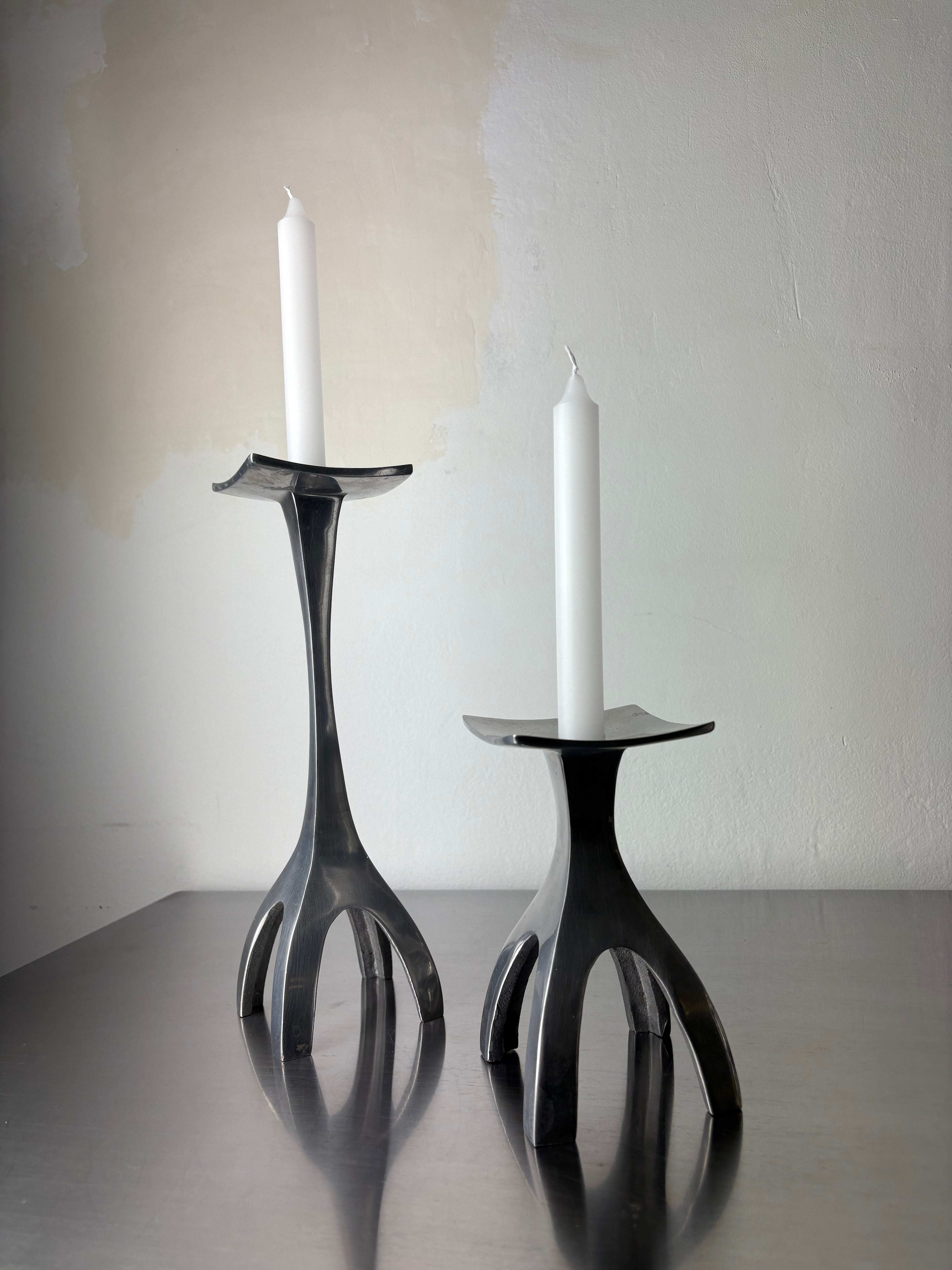 Pair of Biomorphic candleholders, solid aluminum, Spain, 1970's