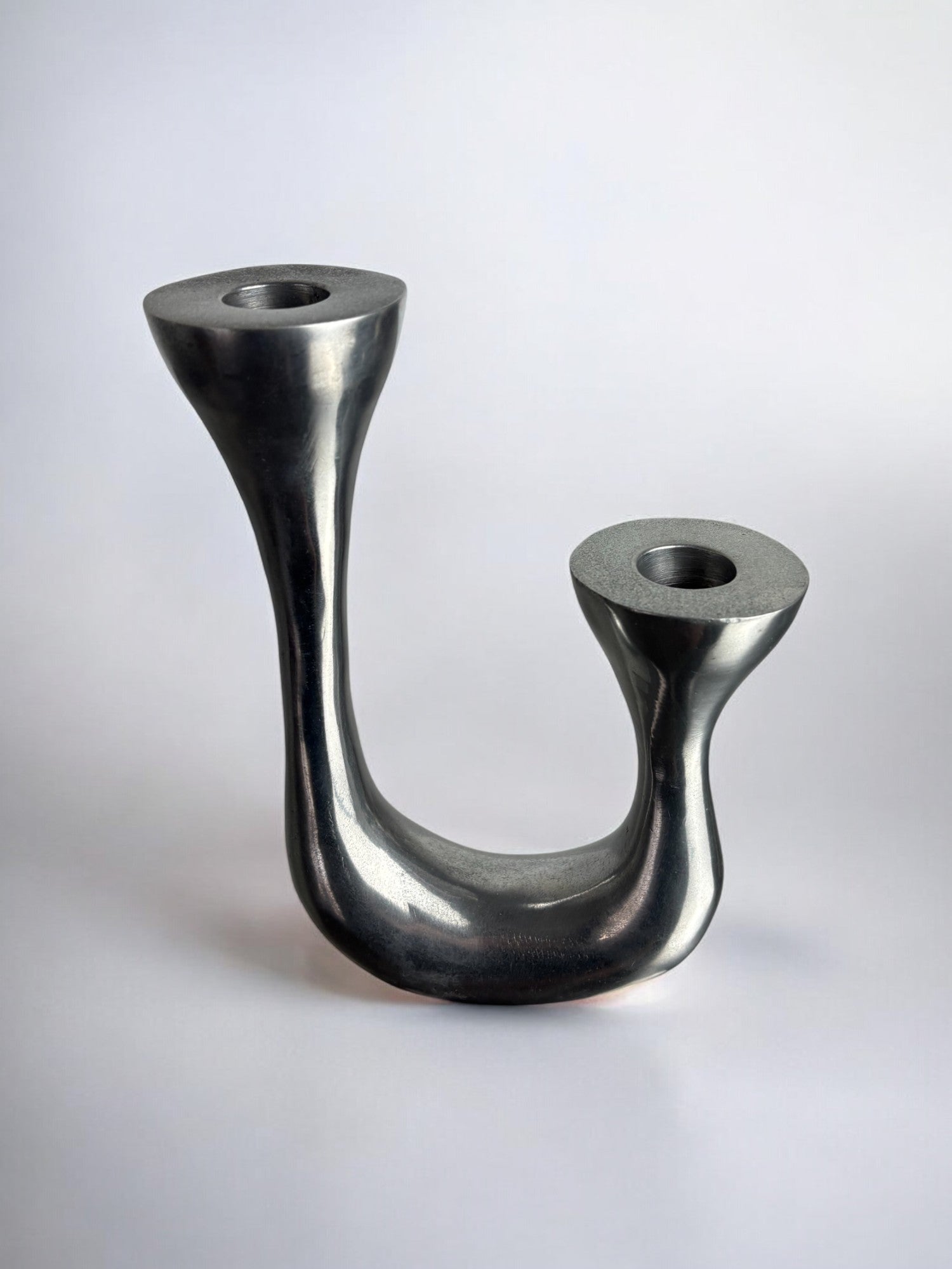 Biomorphic candleholder, solid aluminum, Spain, Circa 1970's