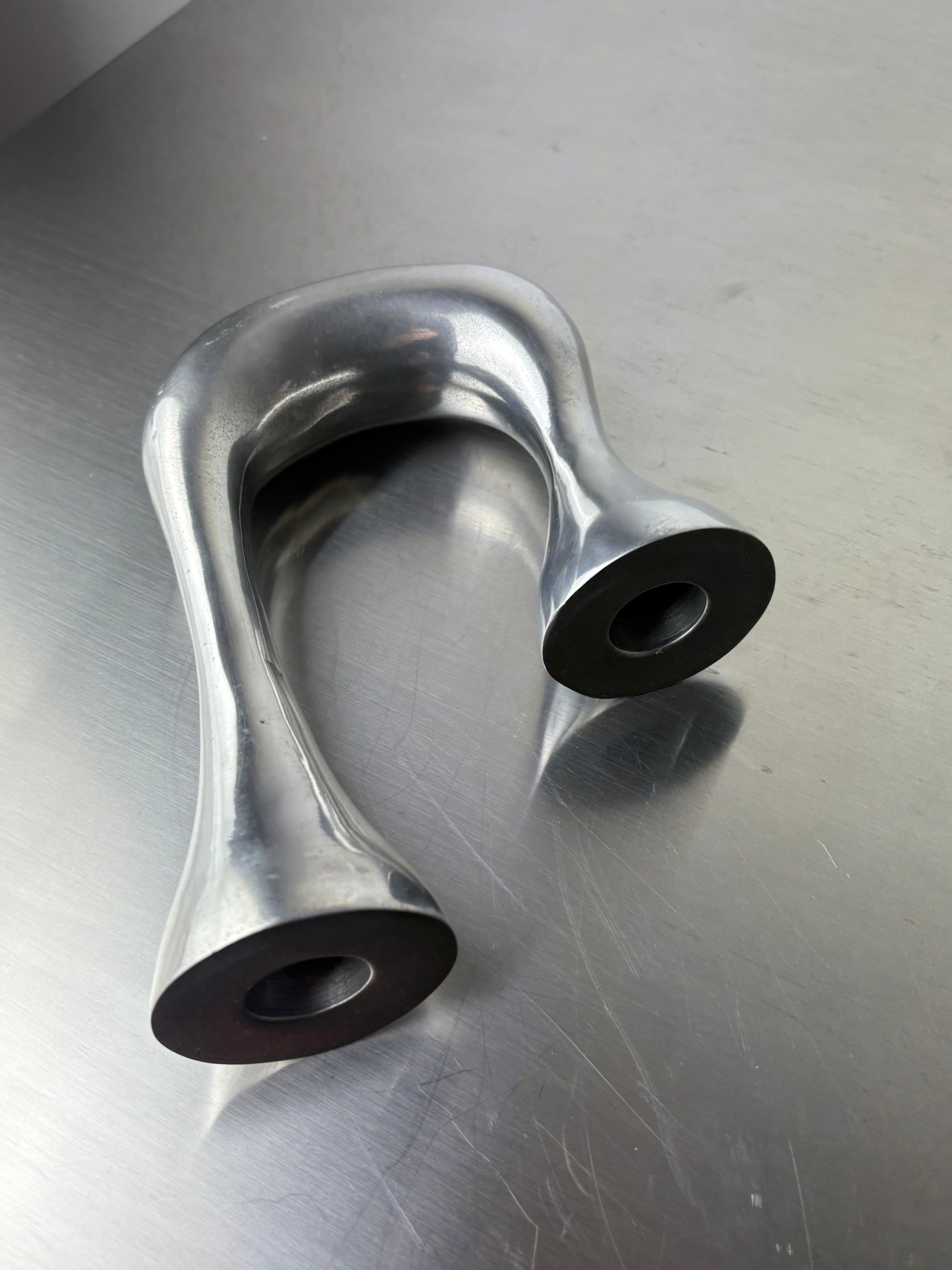 Biomorphic candleholder, solid aluminum, Spain, Circa 1970's