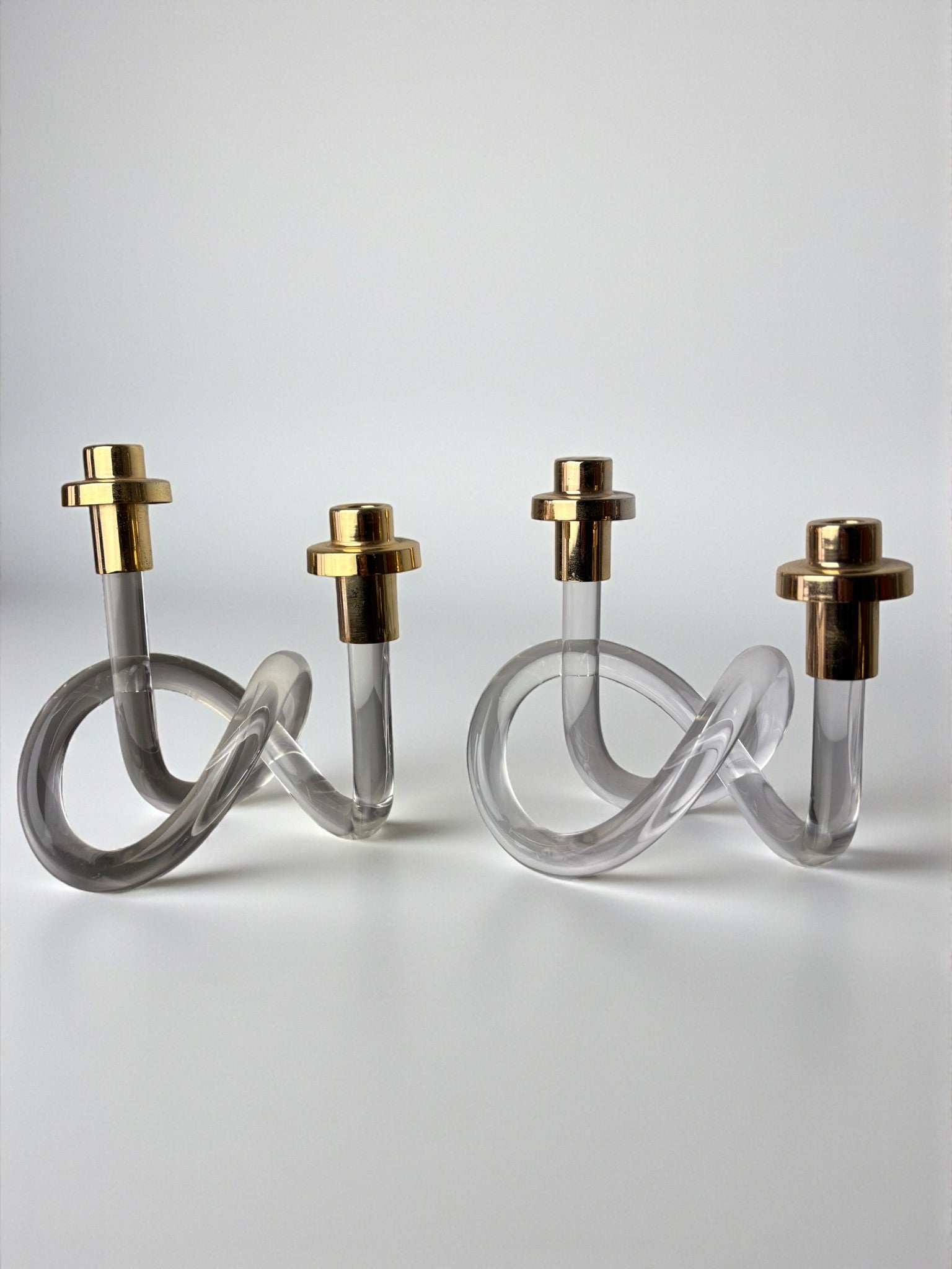 Pair of pretzel candlesticks by Dorothy Thorpe