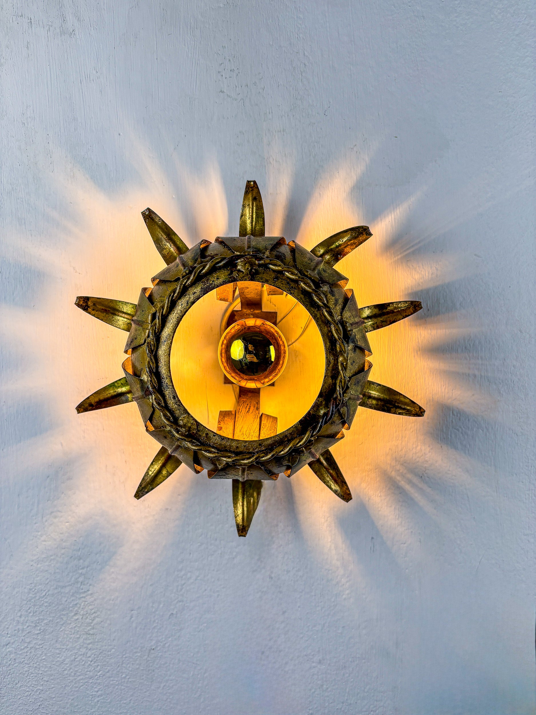 Sunburst ceiling light fixture or sconce in Gilt Wrought Iron, Spain, 1960s