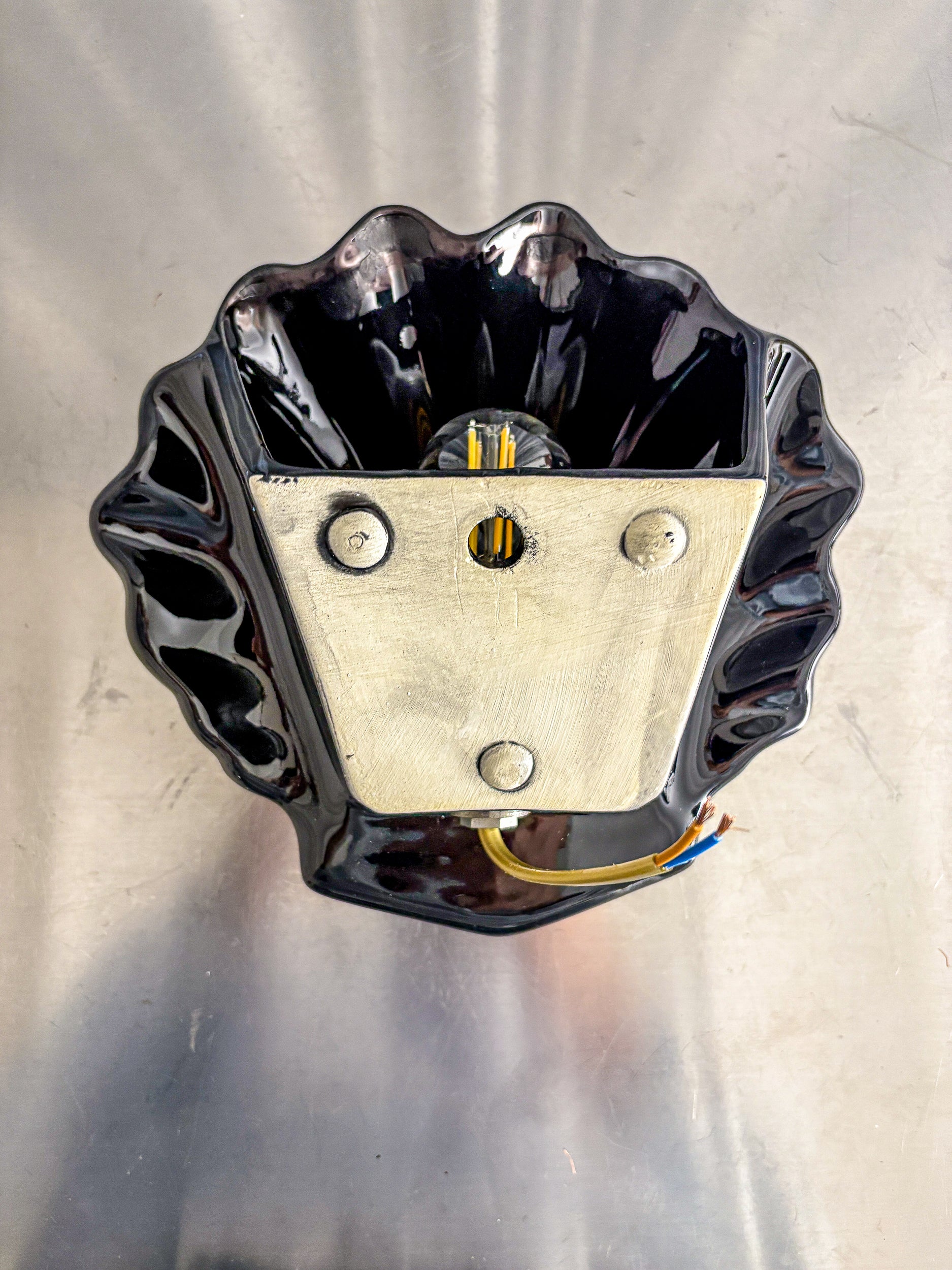 Italian shell-shaped wall sconce, black ceramic, 1970's