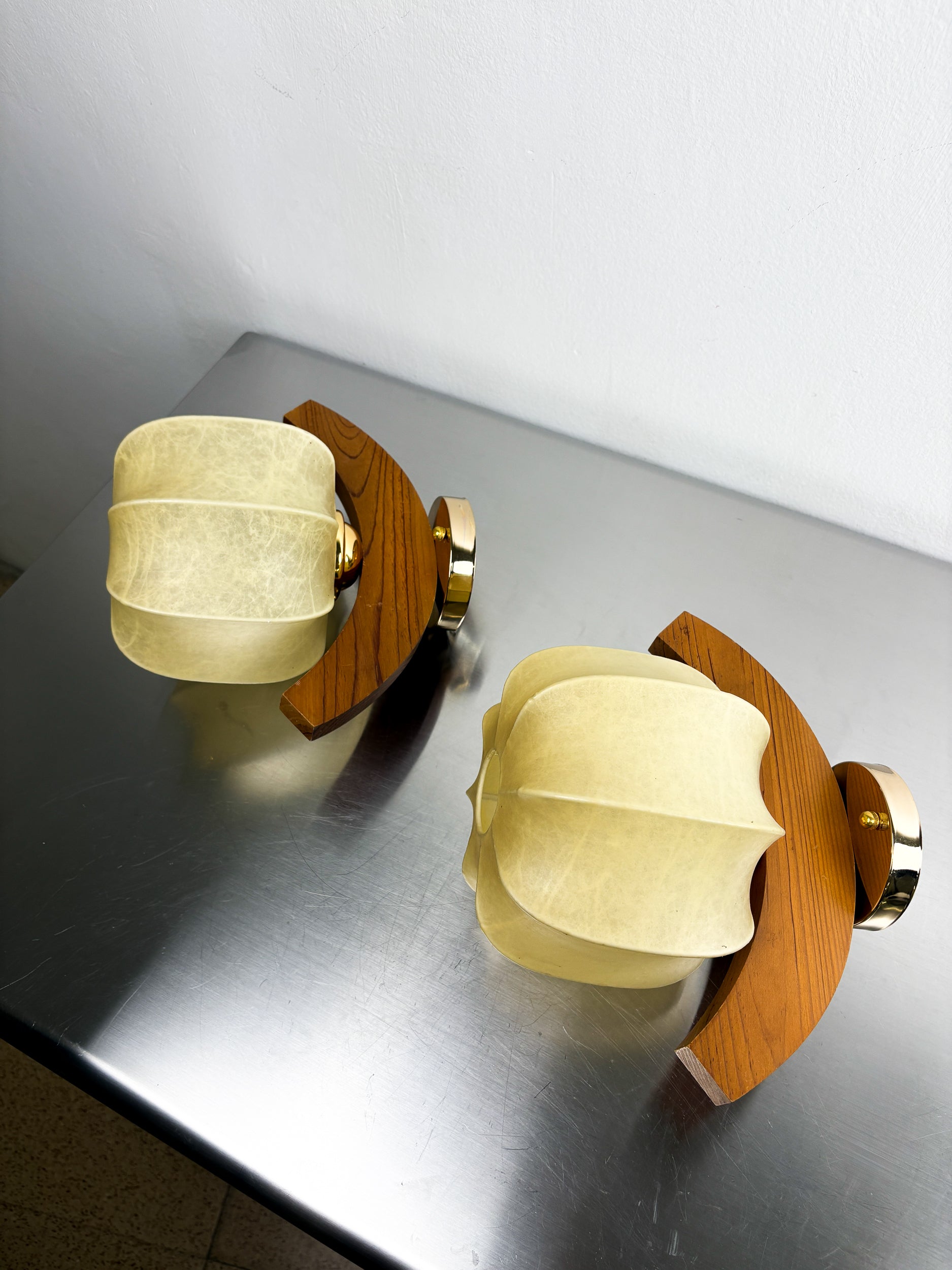 Pair of "Cocoon" wall lights, resin and pine, Italy, 1970's