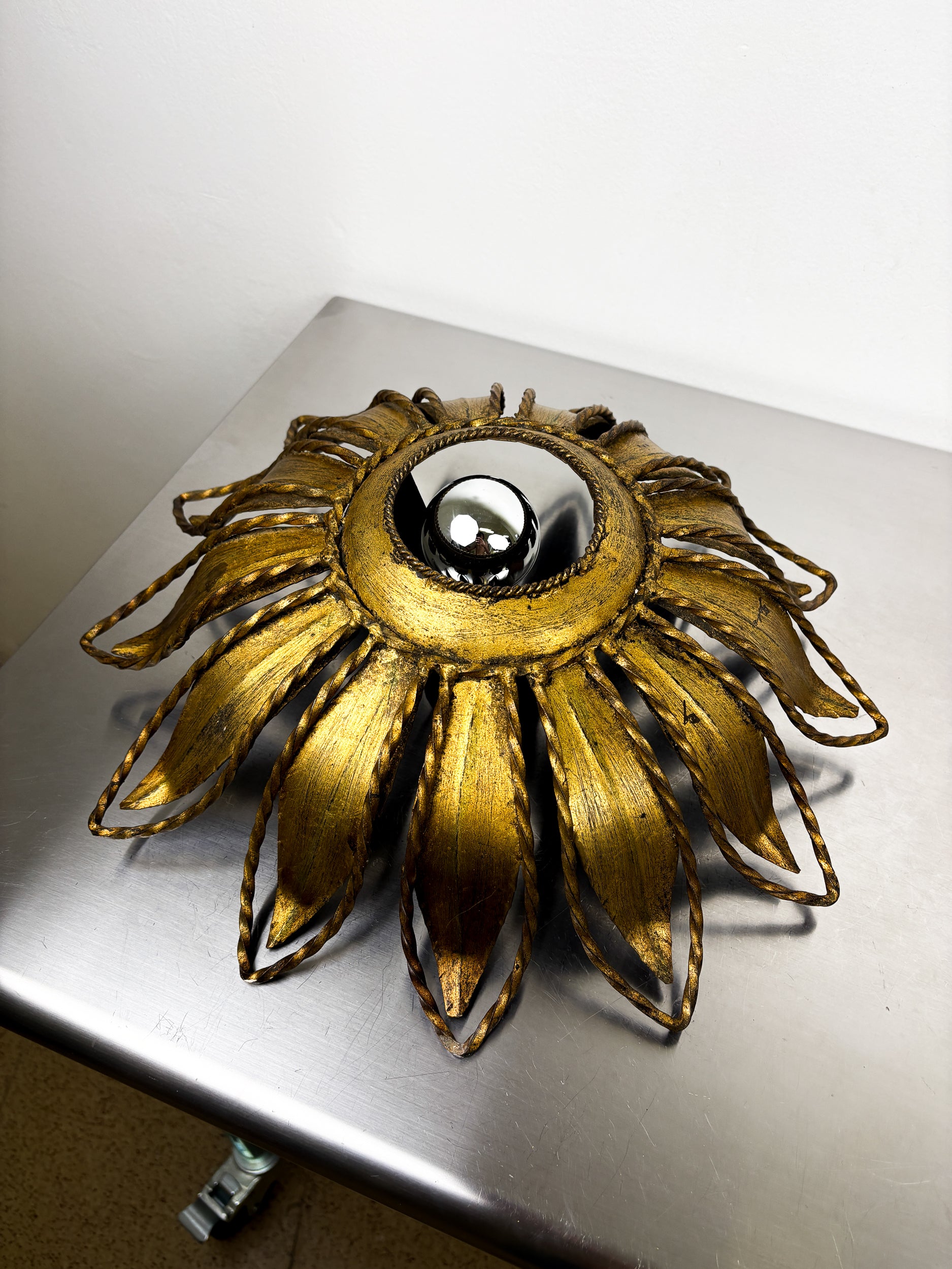 Spanish Sunburst ceiling light fixture or sconce in Gilt Iron, Circa 1960