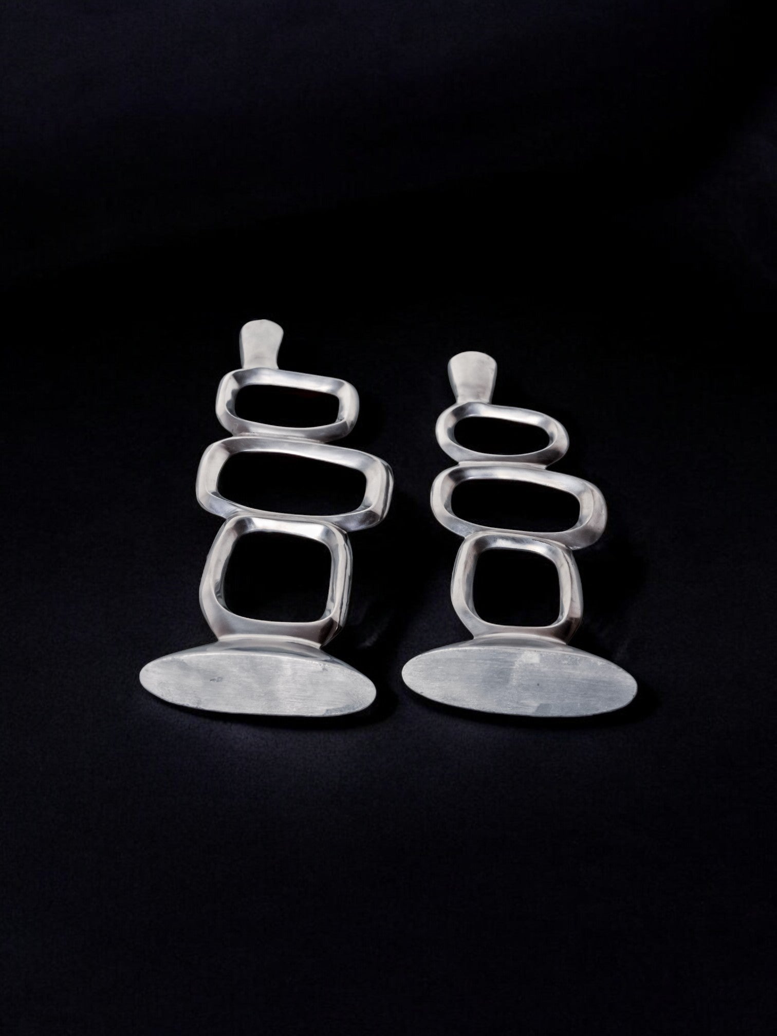 Pair of circle candlesticks by Matthew Hilton, England, 1980