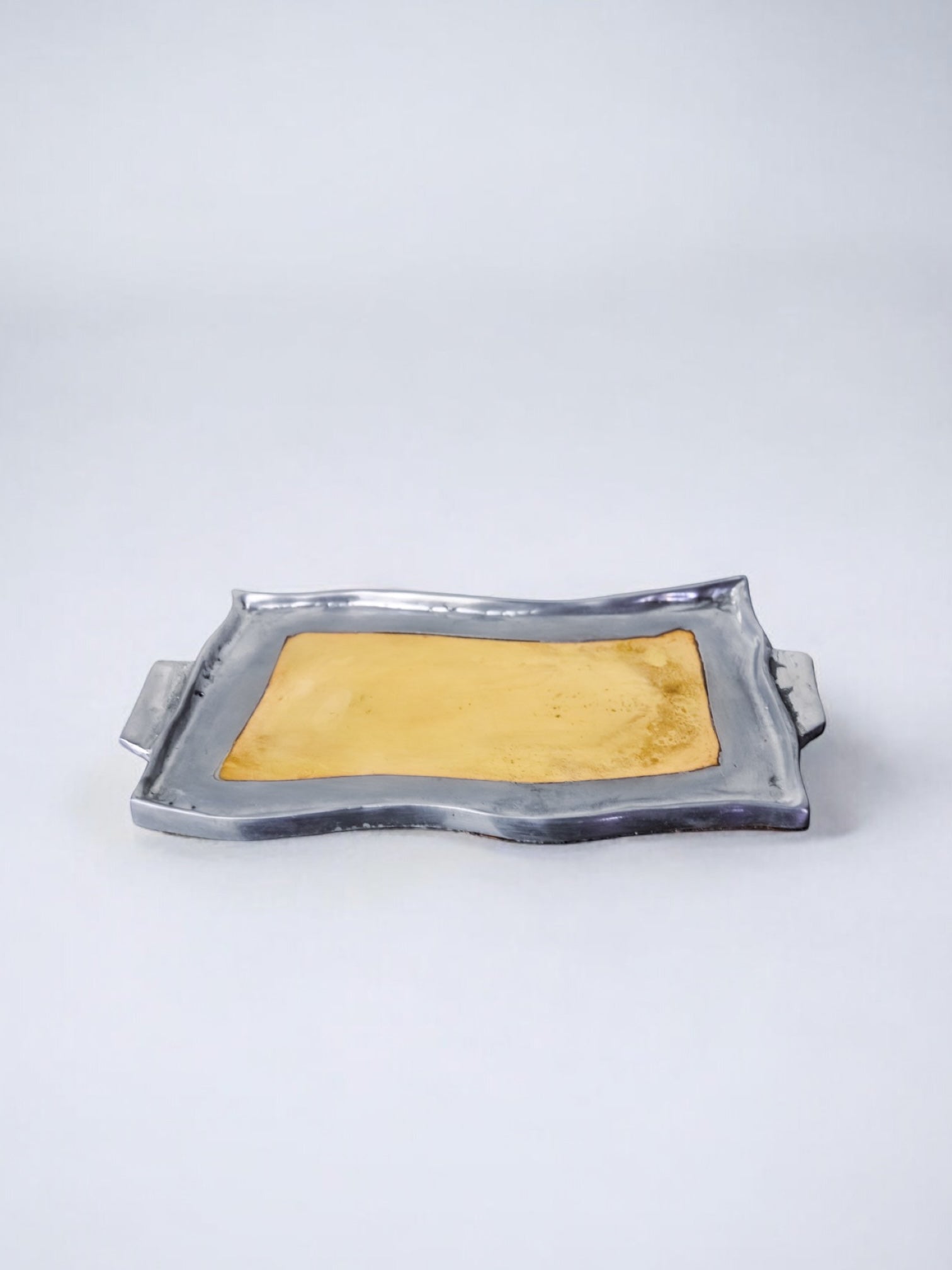 Brutalist pocket emptier by Leopold, bronze and aluminum 1970, Spain