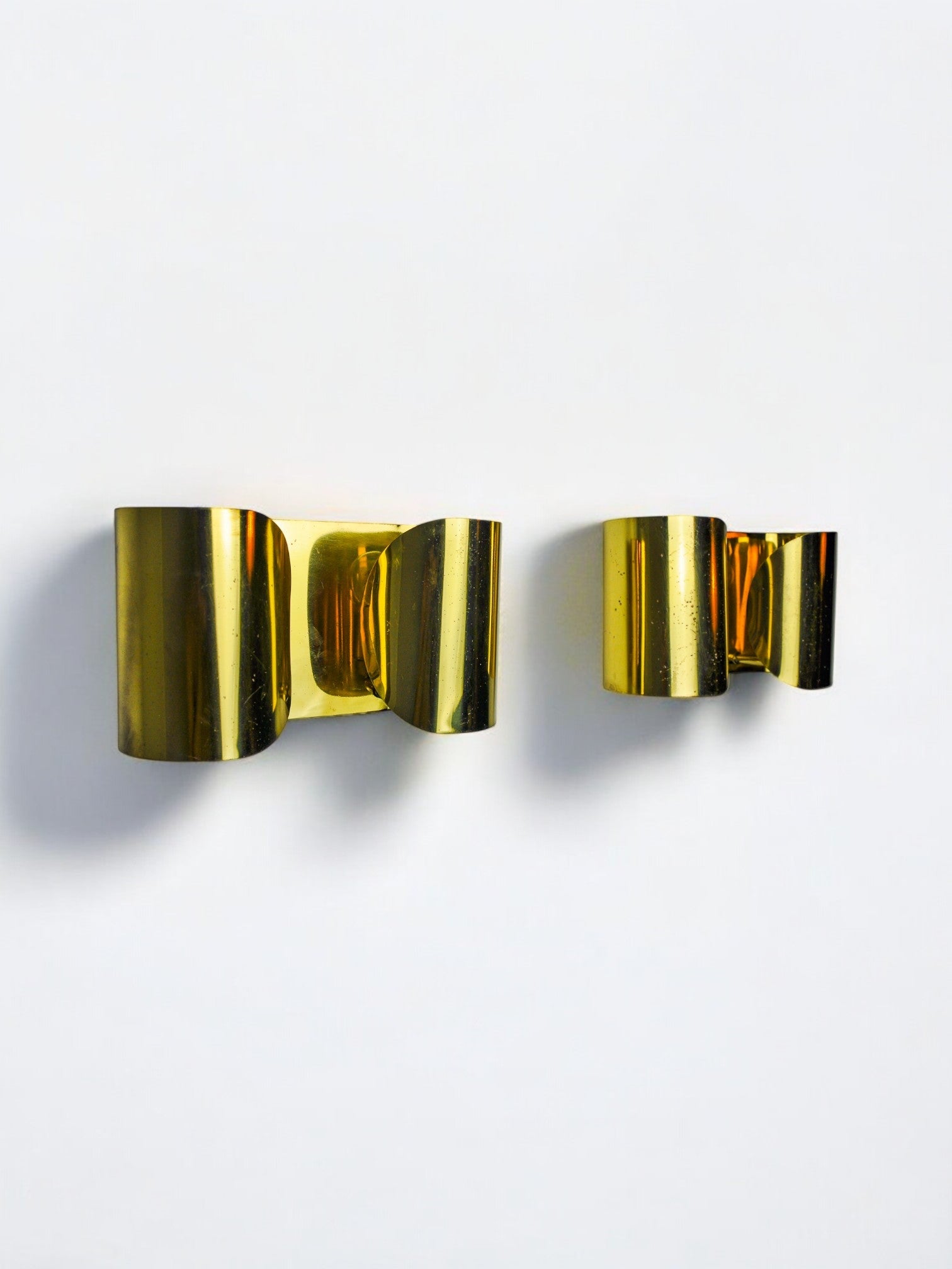 Pair of "Foglios" brass wall lights, Italy, 1970